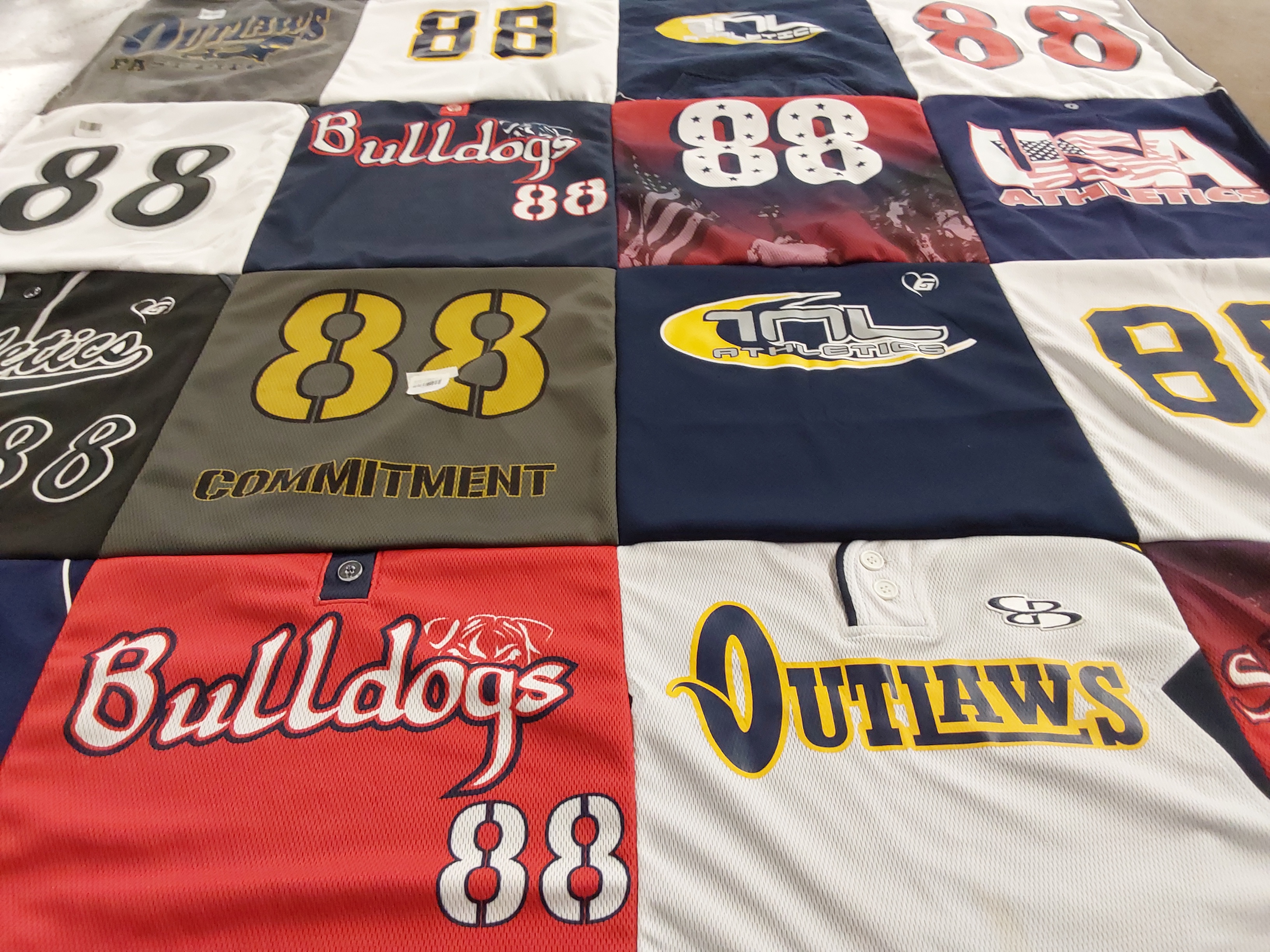 T-shirt quilt with sports, athletics themes by Tiffany from CA