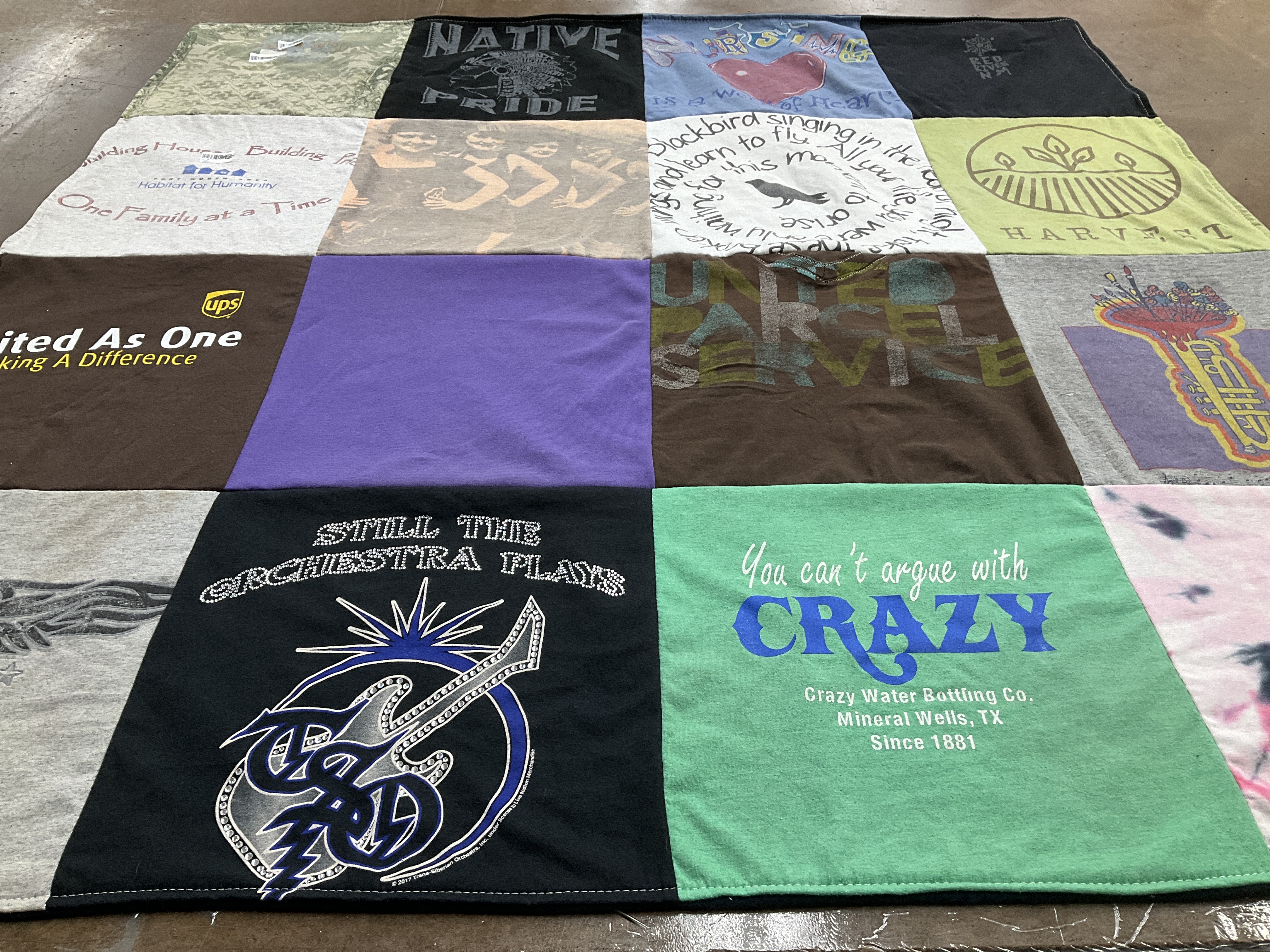 T-shirt quilt with music, community themes by Ariana from TX