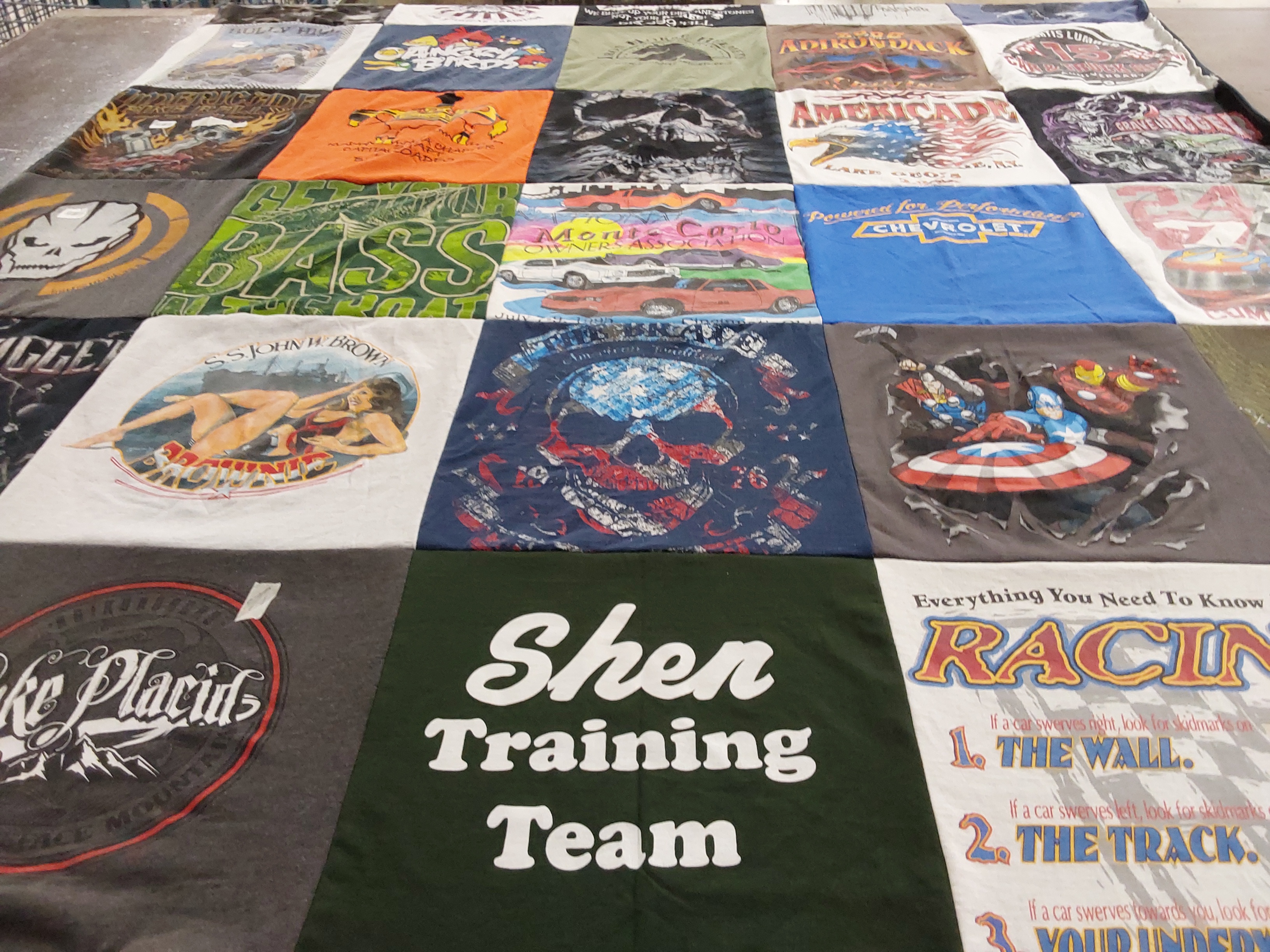 T-shirt quilt featuring shen training team by Christine from NY