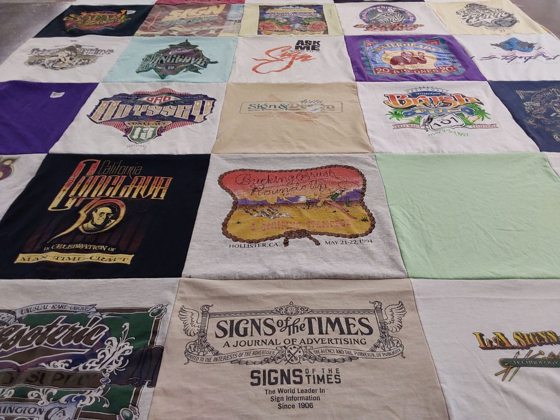 T-shirt quilt with advertising, mardi gras themes by Robin from CA