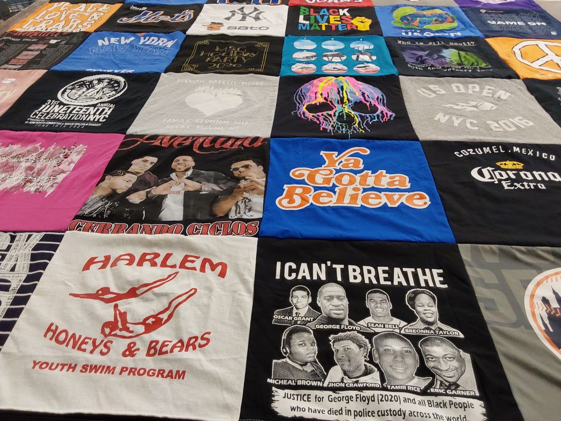 T-shirt quilt with social justice, swimming themes by Harriet from NY