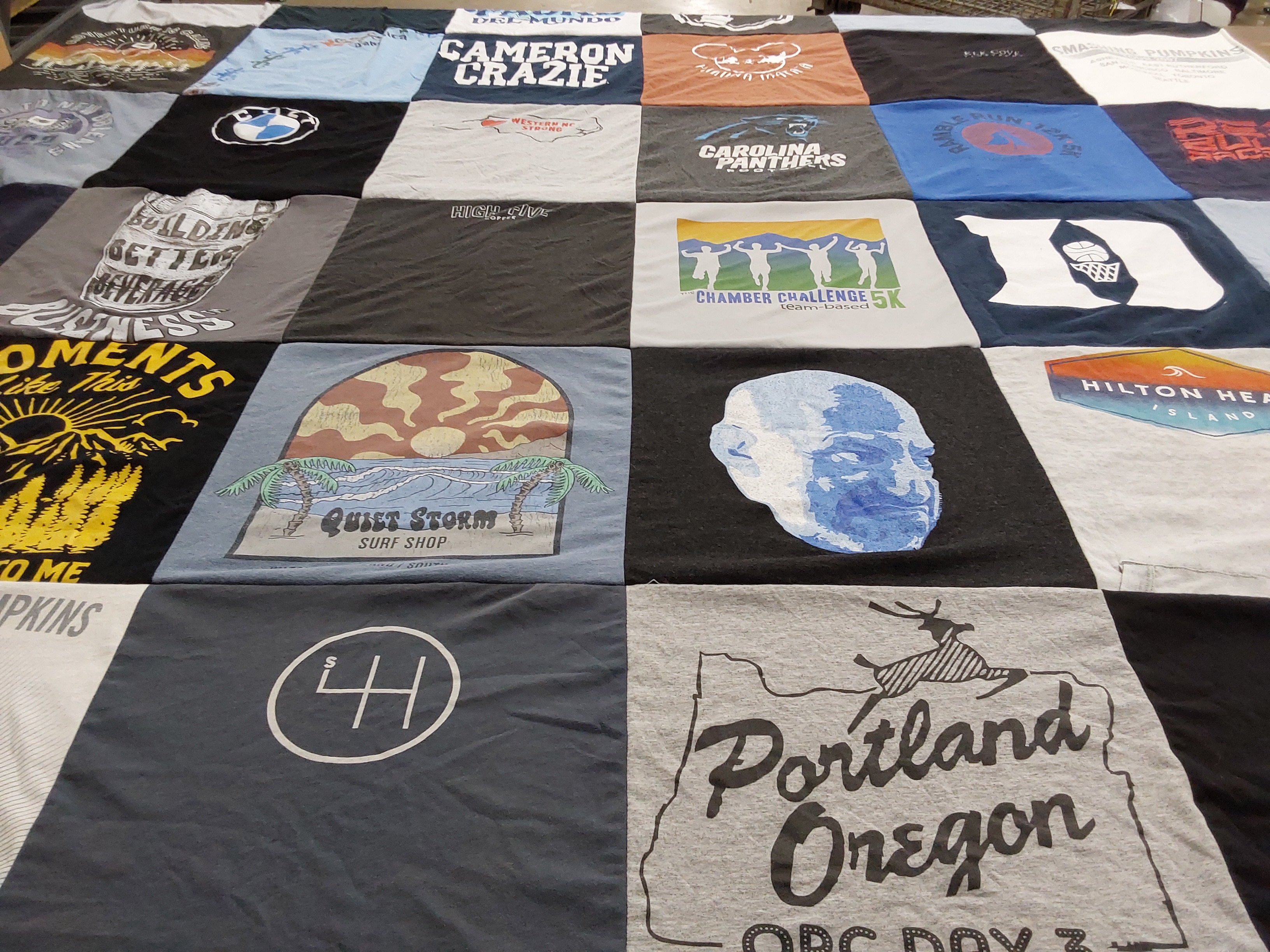 T-shirt quilt with surfing, running themes by Allyson from SC