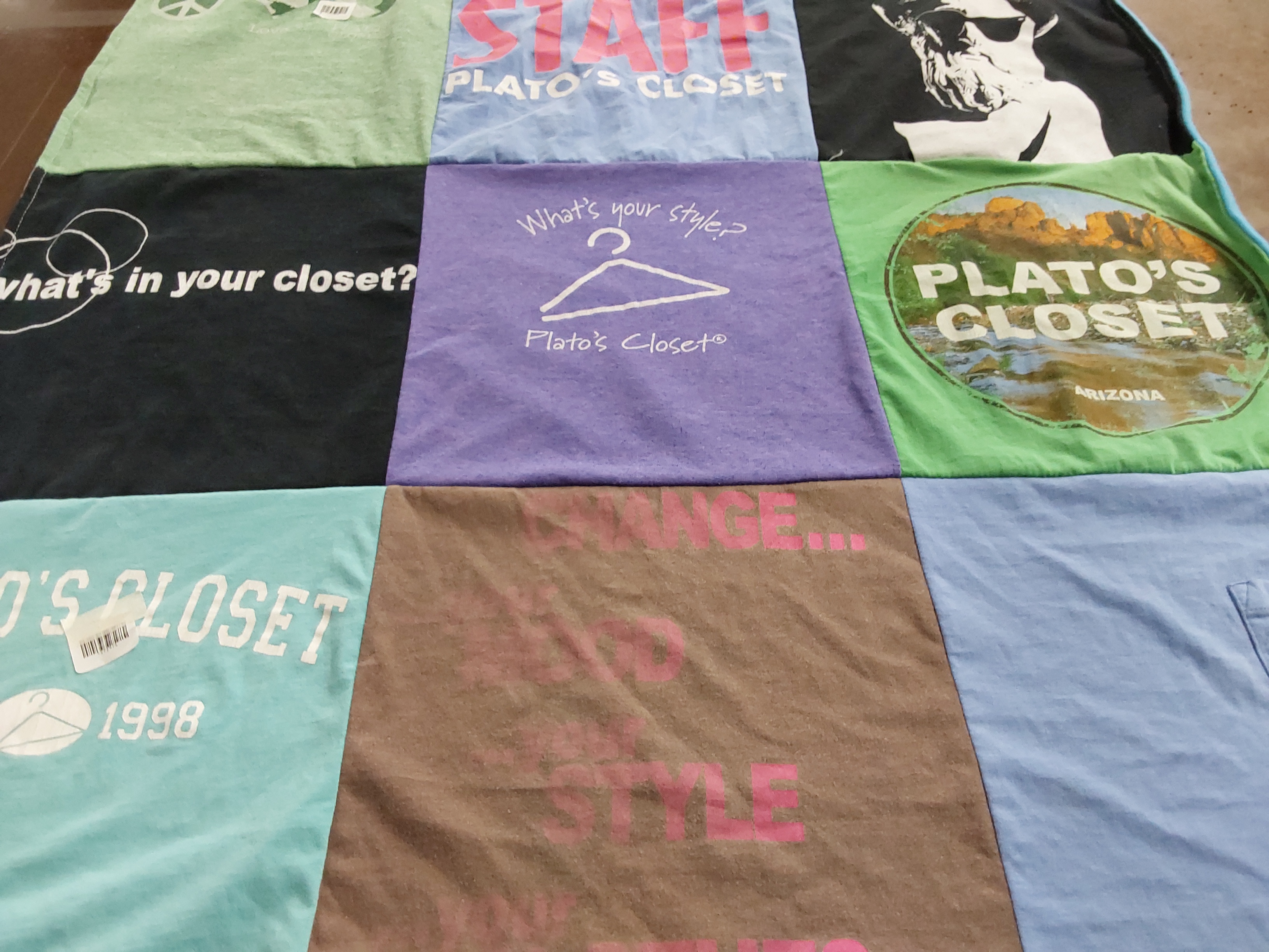 T-shirt quilt with fashion, sustainability themes by CATHERINE from TX