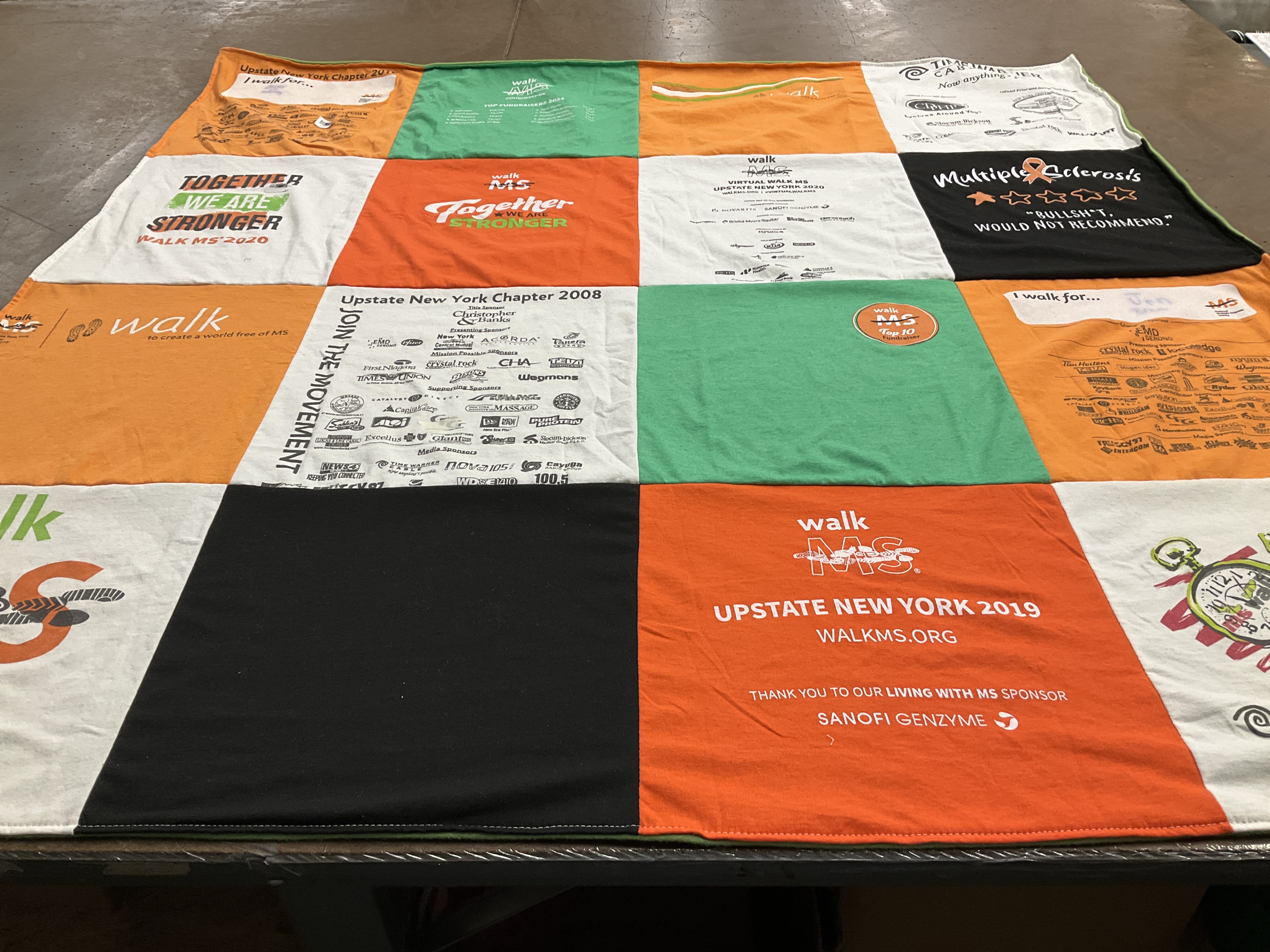 T-shirt quilt with health, community support themes by Barbara from NY