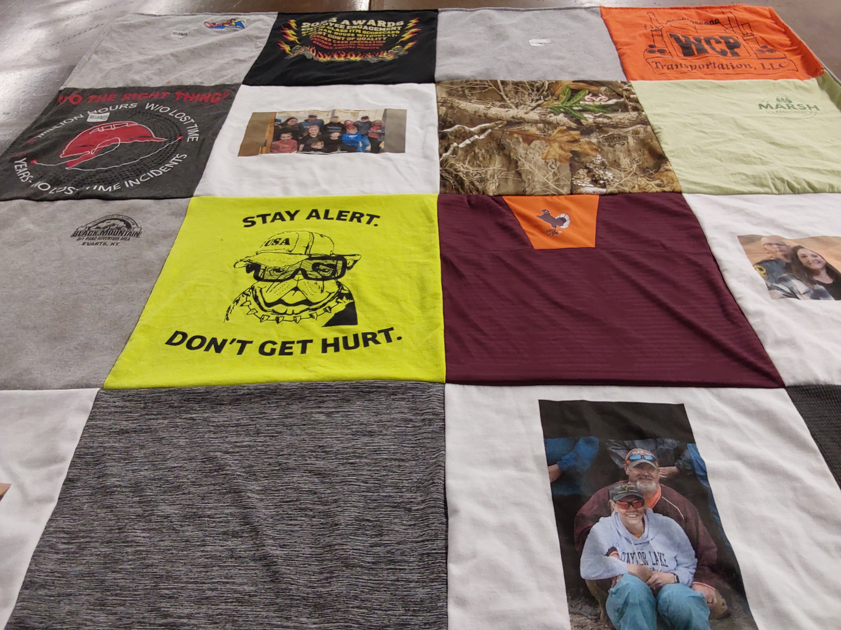 T-shirt quilt with safety, pet care themes by Roberta from VA