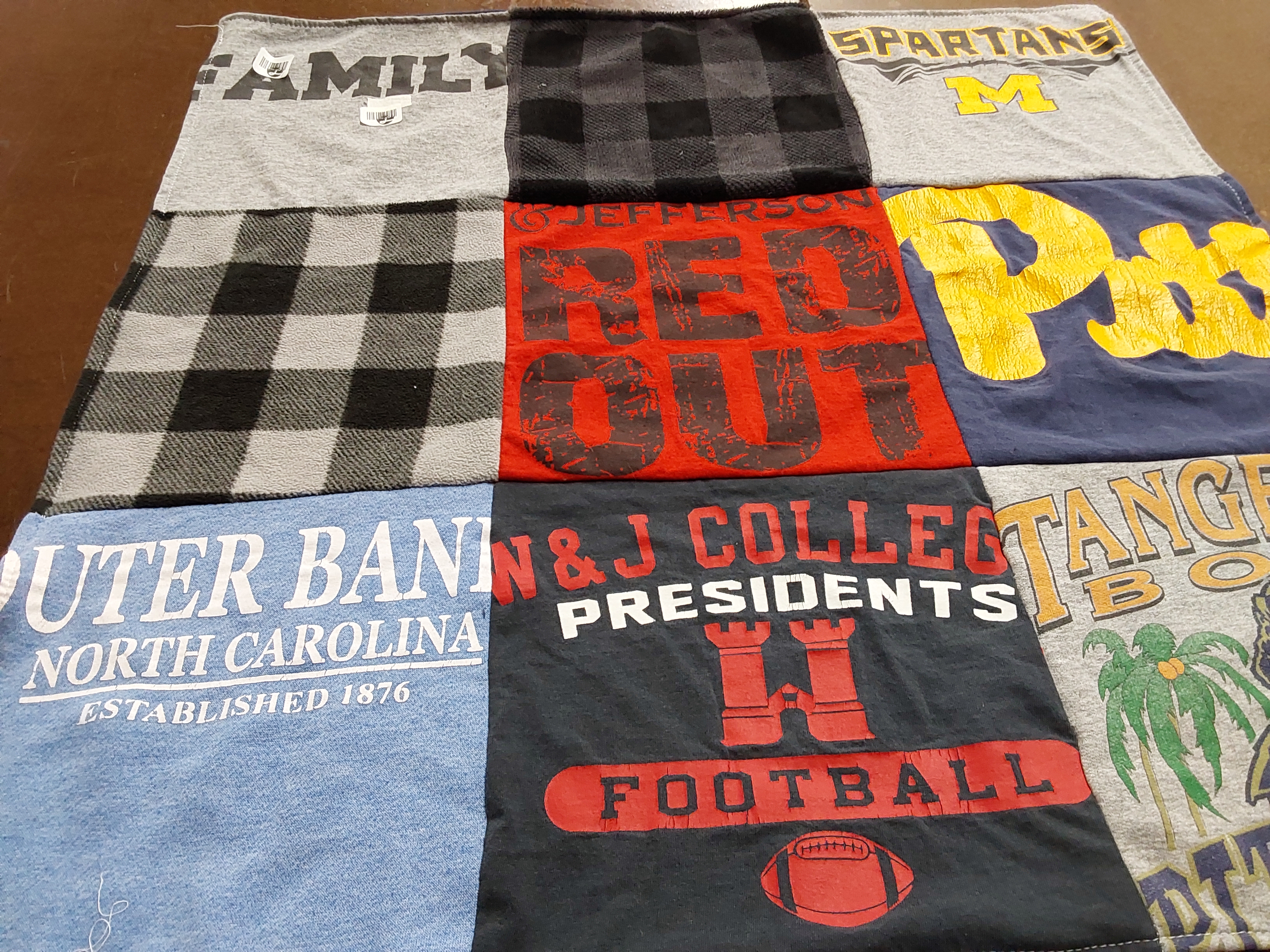 T-shirt quilt featuring n&j college football by Sally from PA