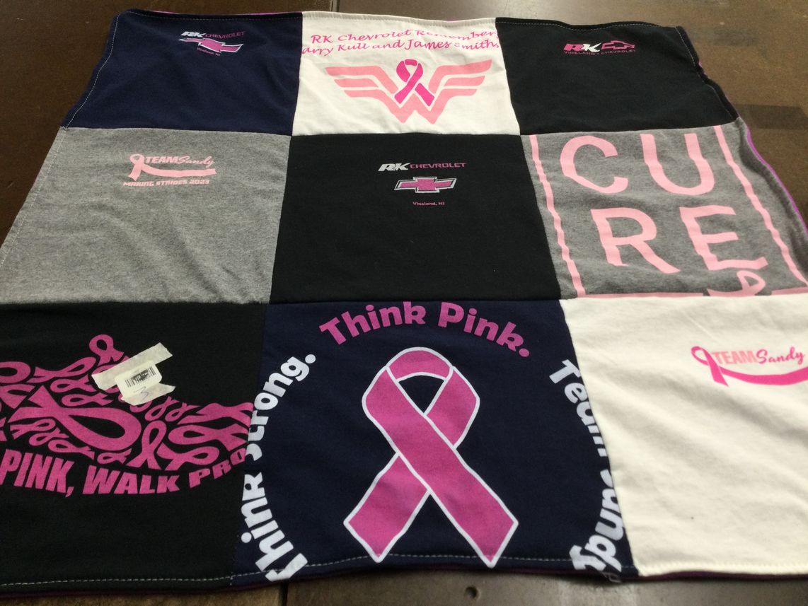 T-shirt quilt with breast cancer awareness, community support themes by Paula from NJ