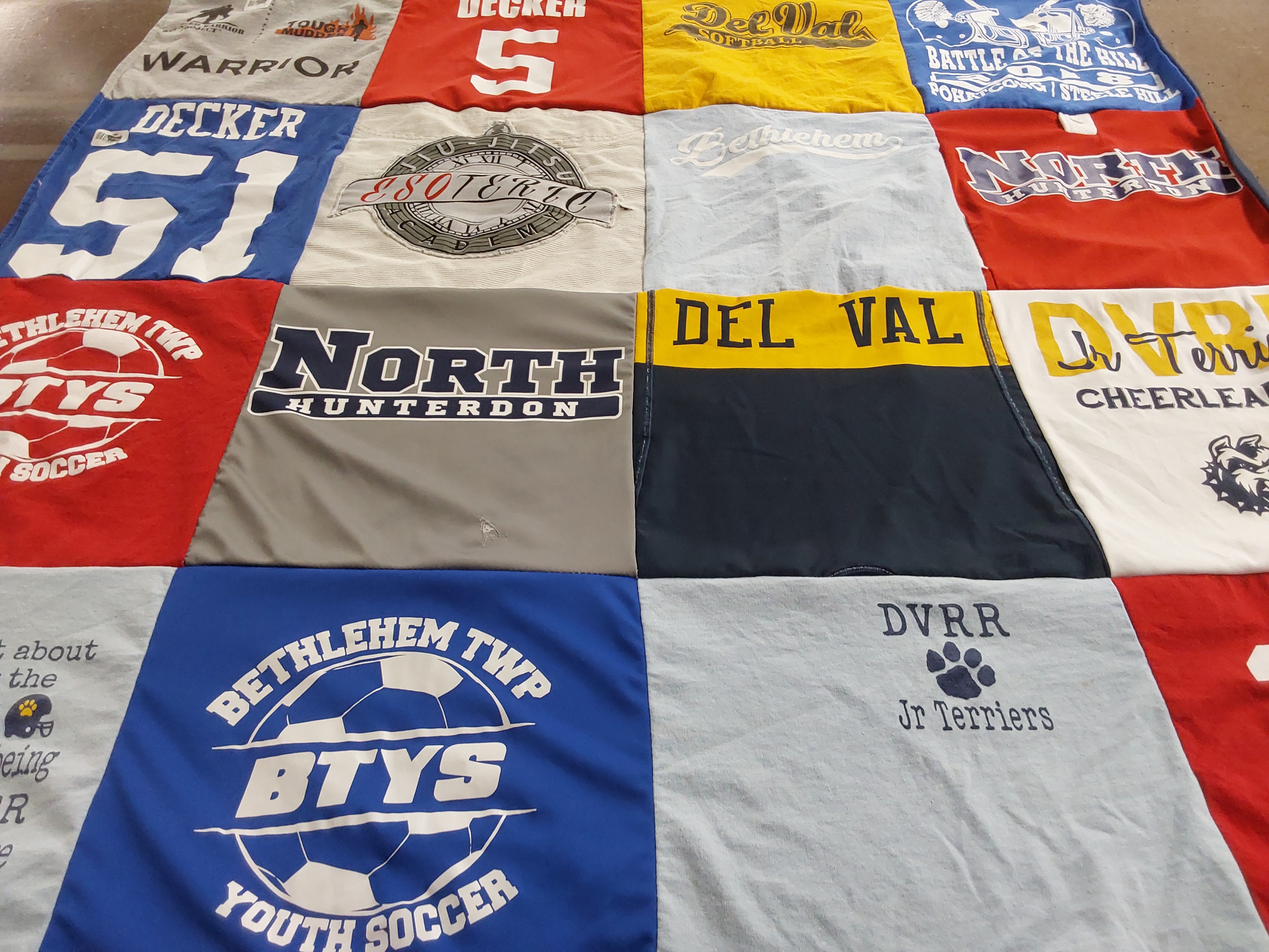 T-shirt quilt featuring delaware valley regional high school, north hunterdon high school by Jada from NJ