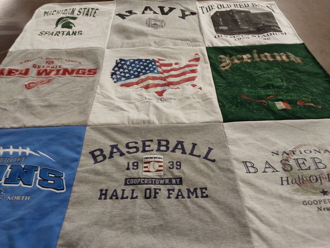 T-shirt quilt featuring michigan state spartans, detroit red wings by Lauren from OH