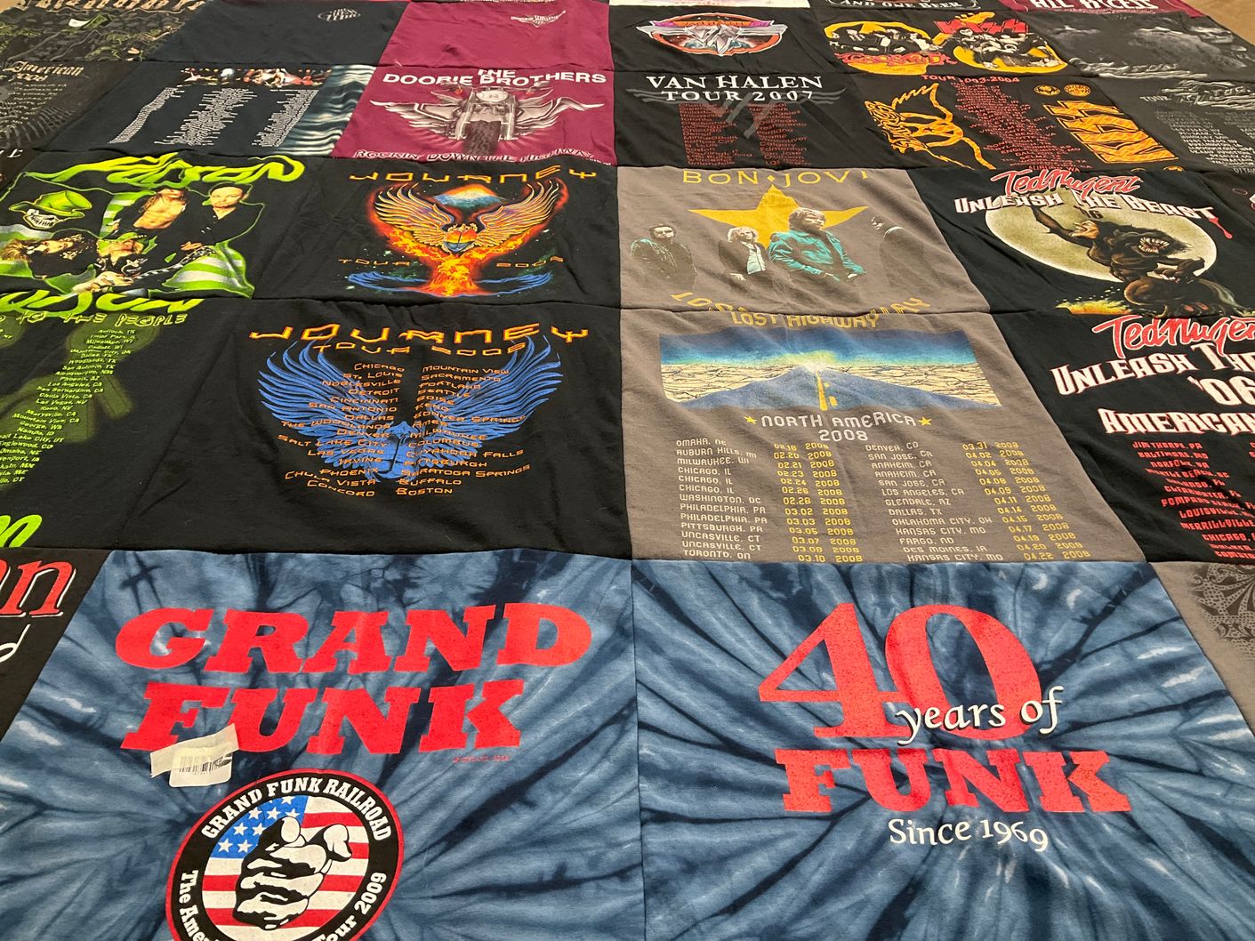 T-shirt quilt with music, concerts themes by MARY from IA