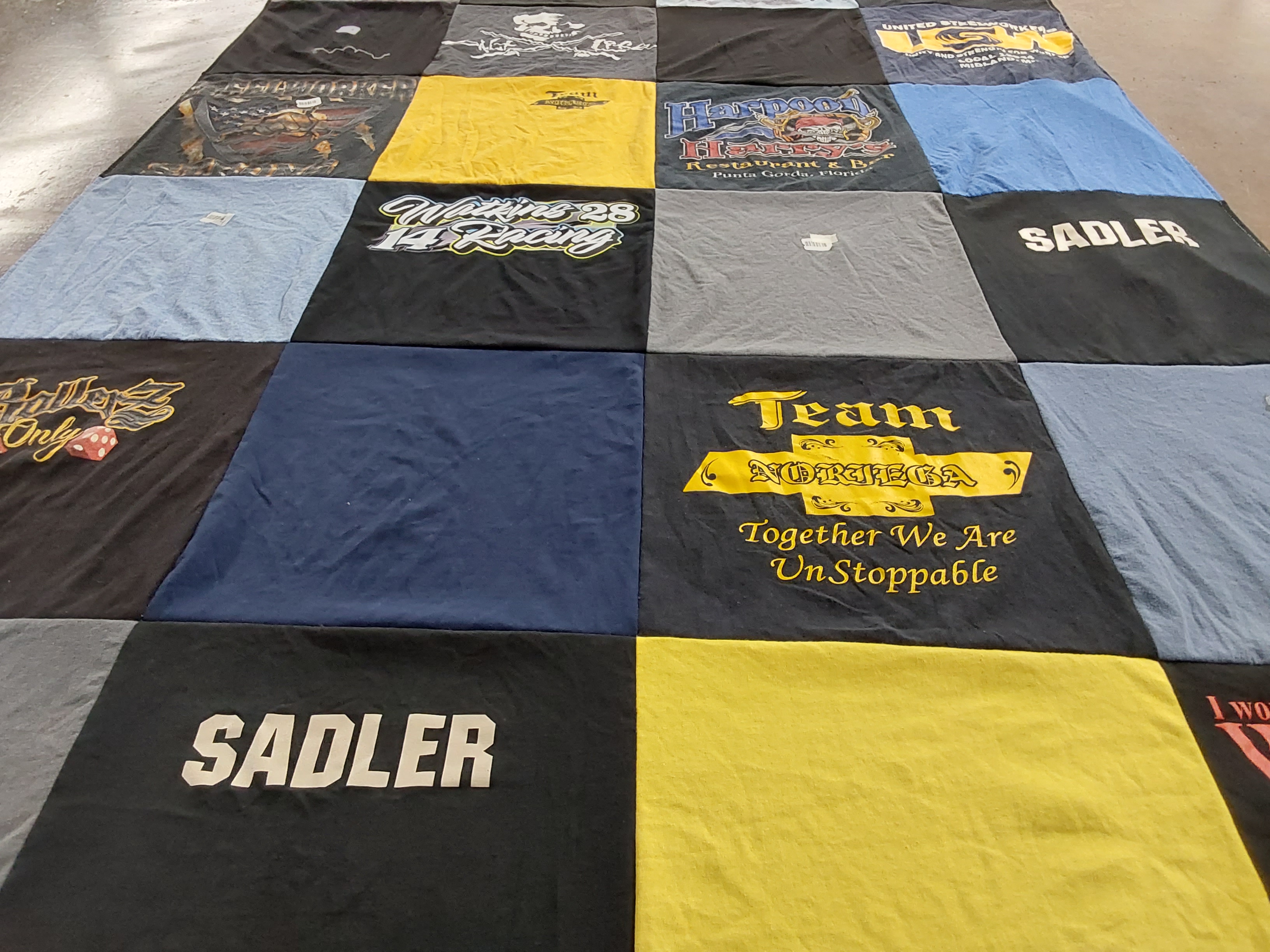 T-shirt quilt with motor racing, community themes by Lisa from MI