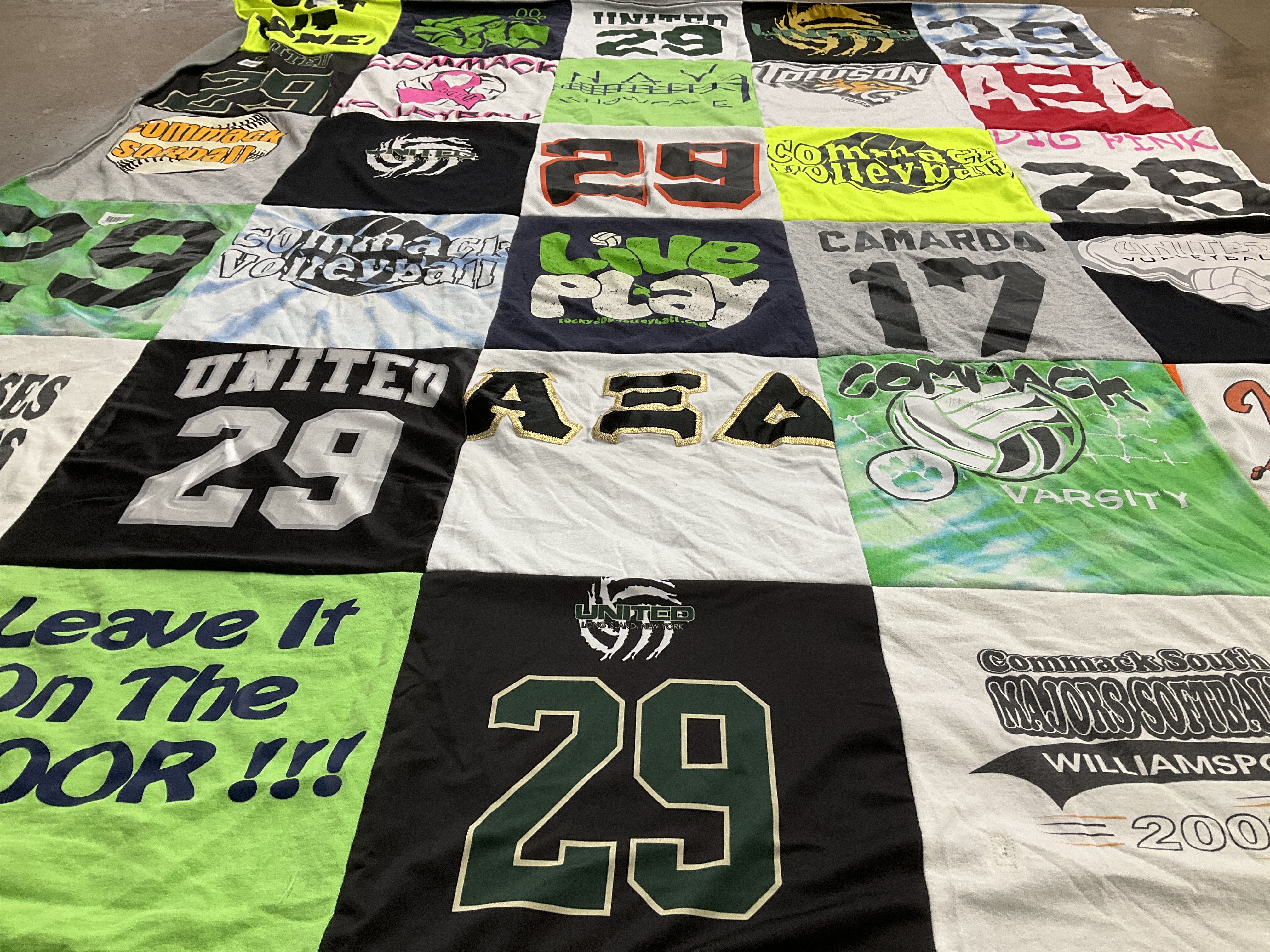 T-shirt quilt with sports, volleyball themes by Patricia from NY