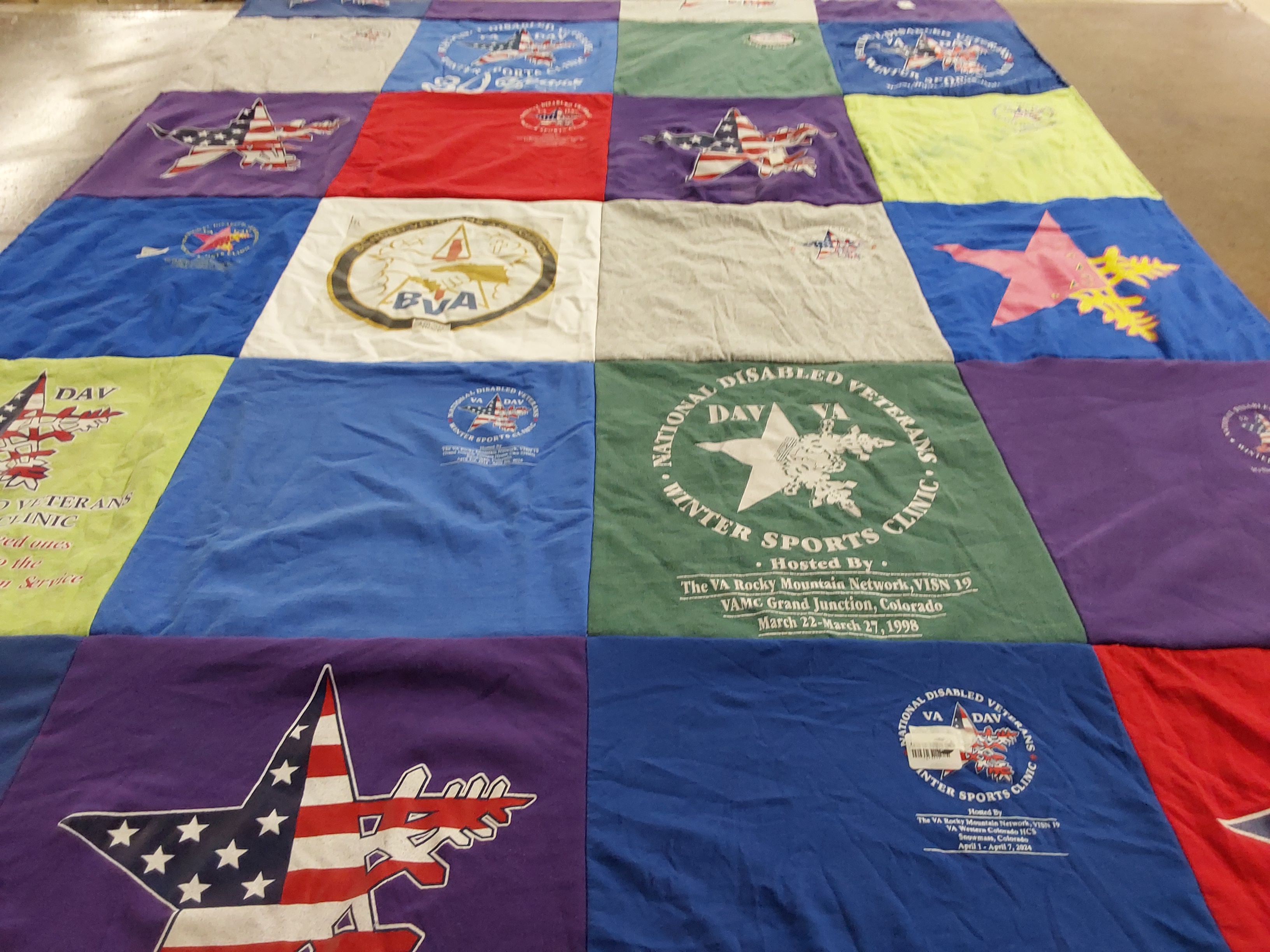 T-shirt quilt with veterans, sports themes by MICHAUN from VA