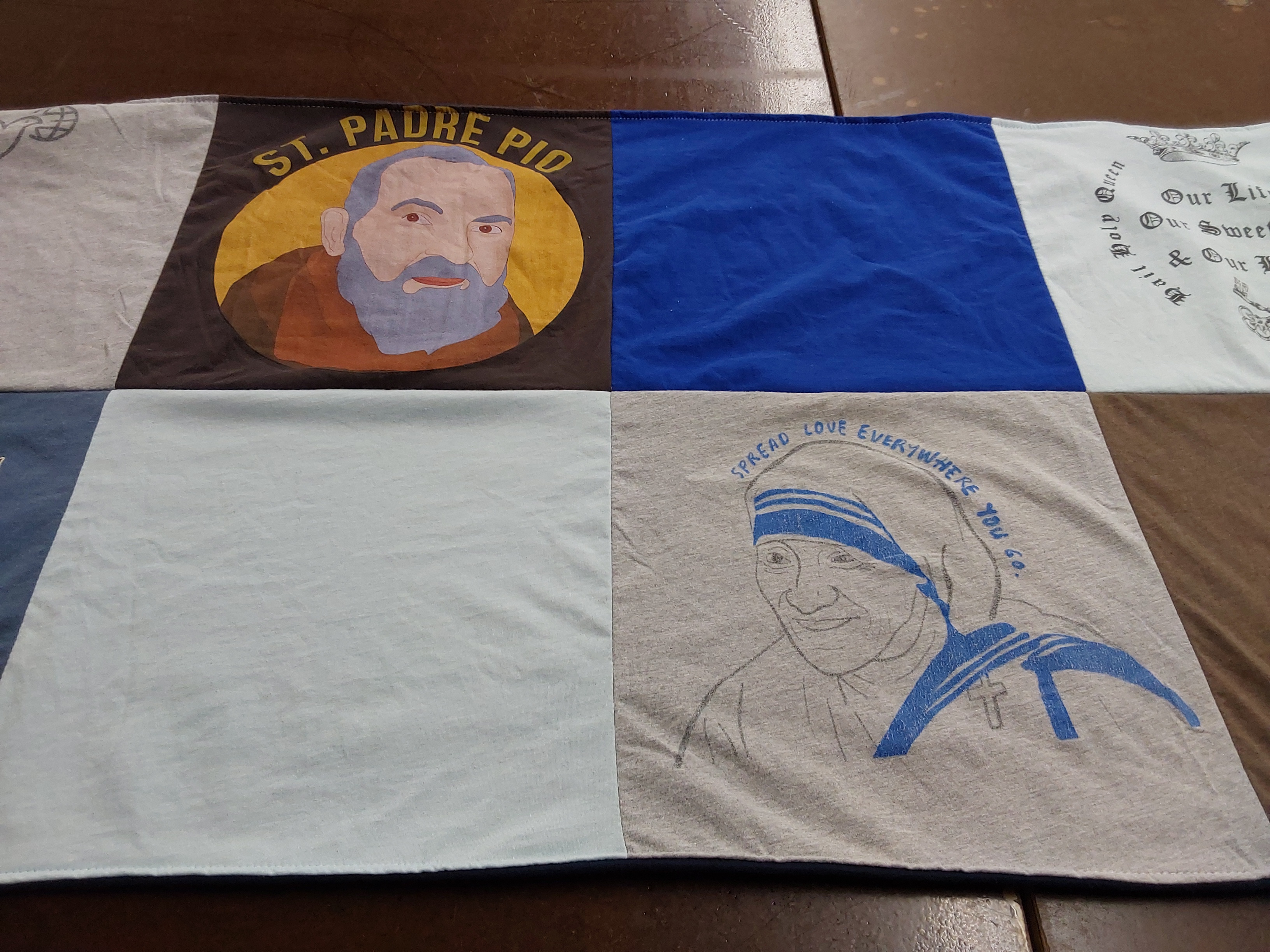 T-shirt quilt with religion, philanthropy themes by Catherine from NJ
