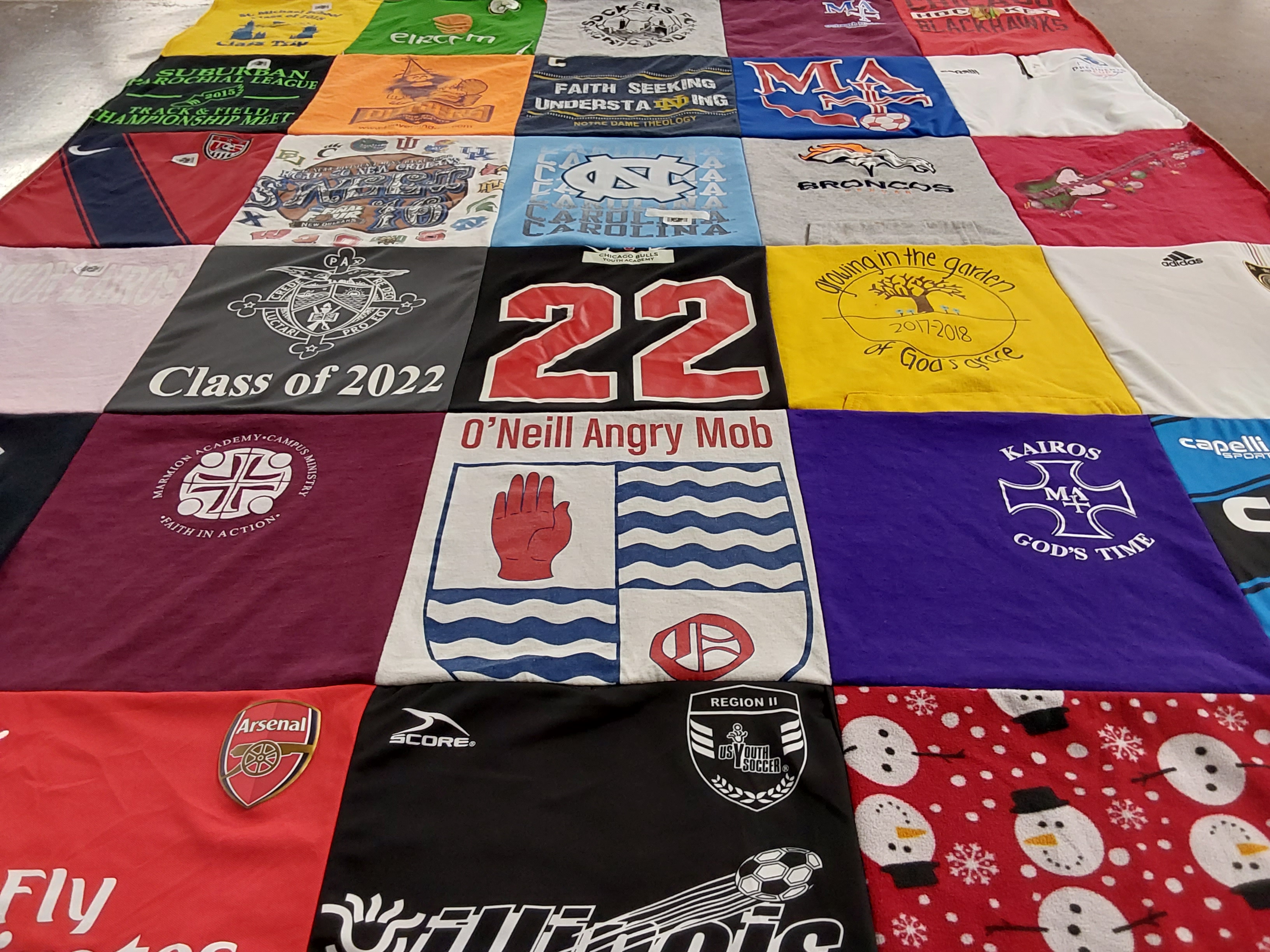 T-shirt quilt featuring arsenal soccer team by Monica from IL