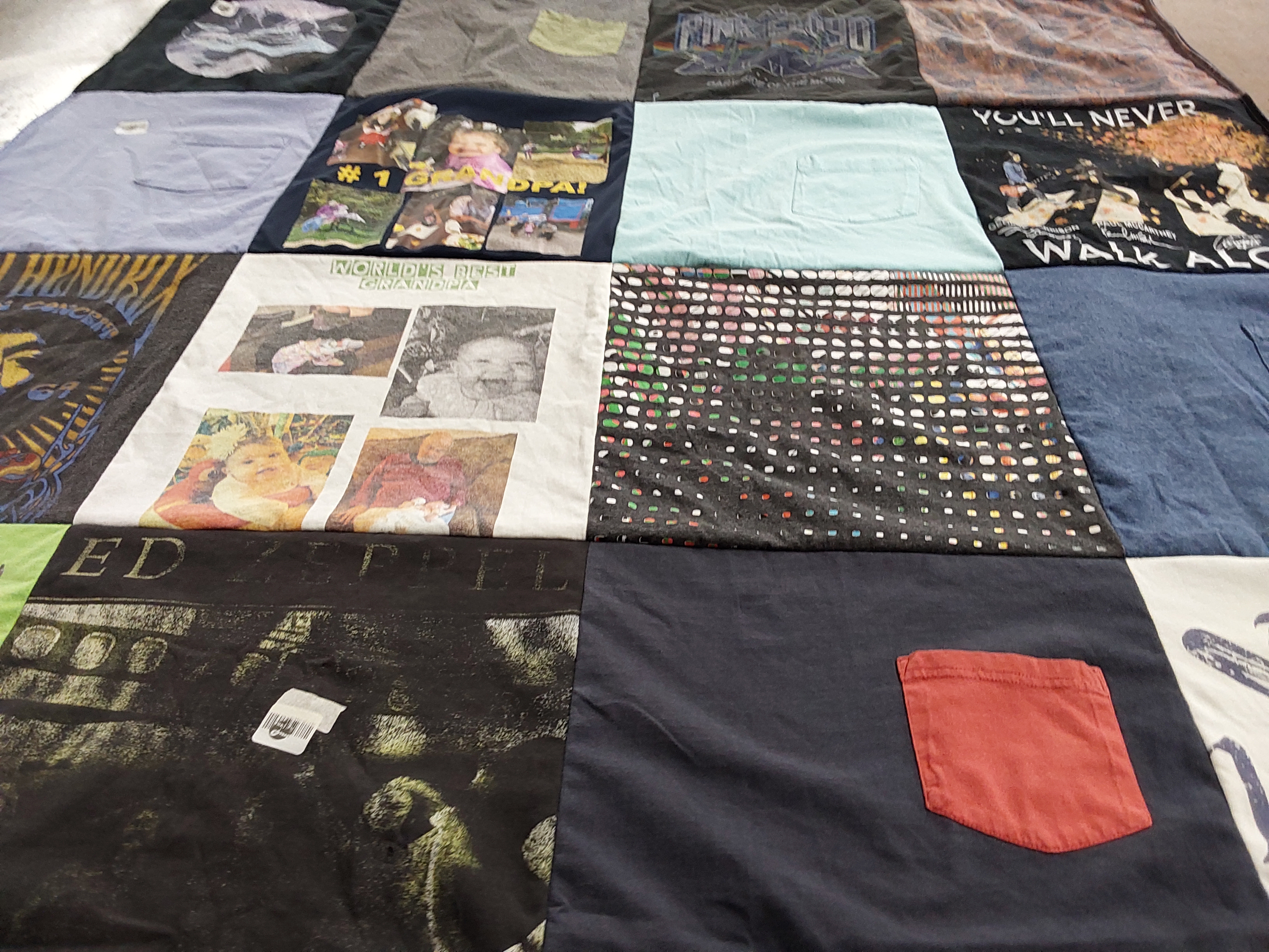 T-shirt quilt with family, music themes by Mary from NJ