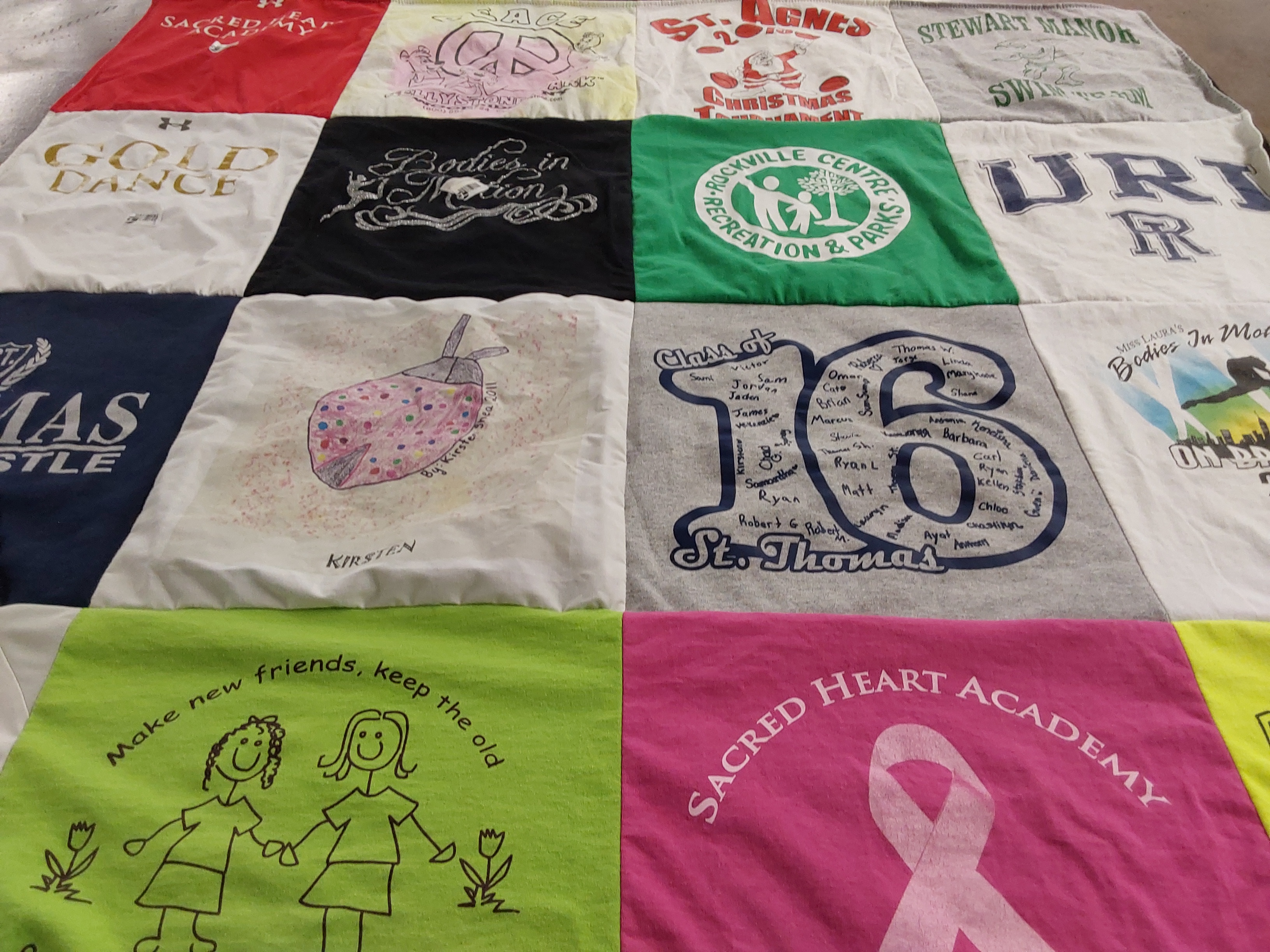 T-shirt quilt featuring st thomas aquinas high school by Linda from NY