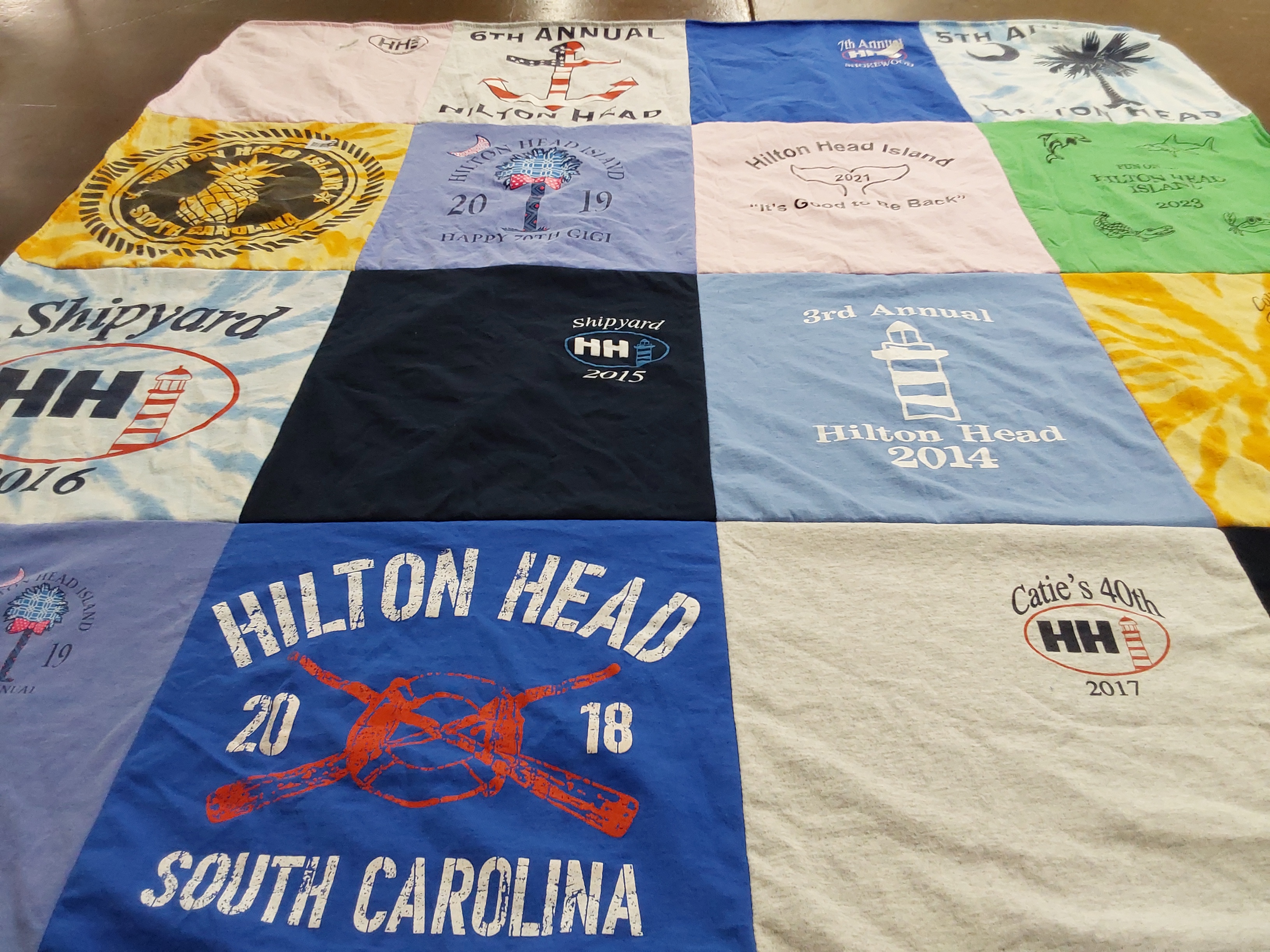 T-shirt quilt with events, celebrations themes by Catherine from NY
