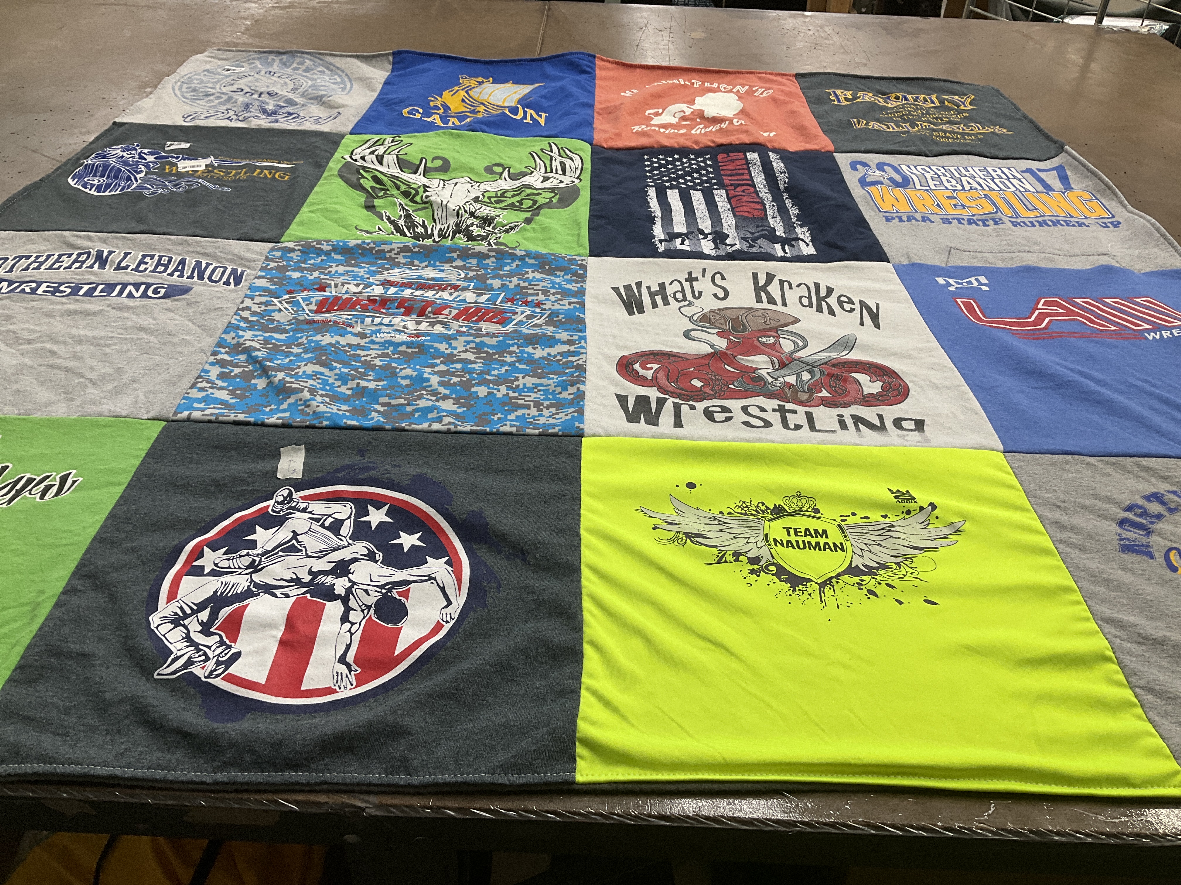 T-shirt quilt with wrestling, sports themes by Laura from PA