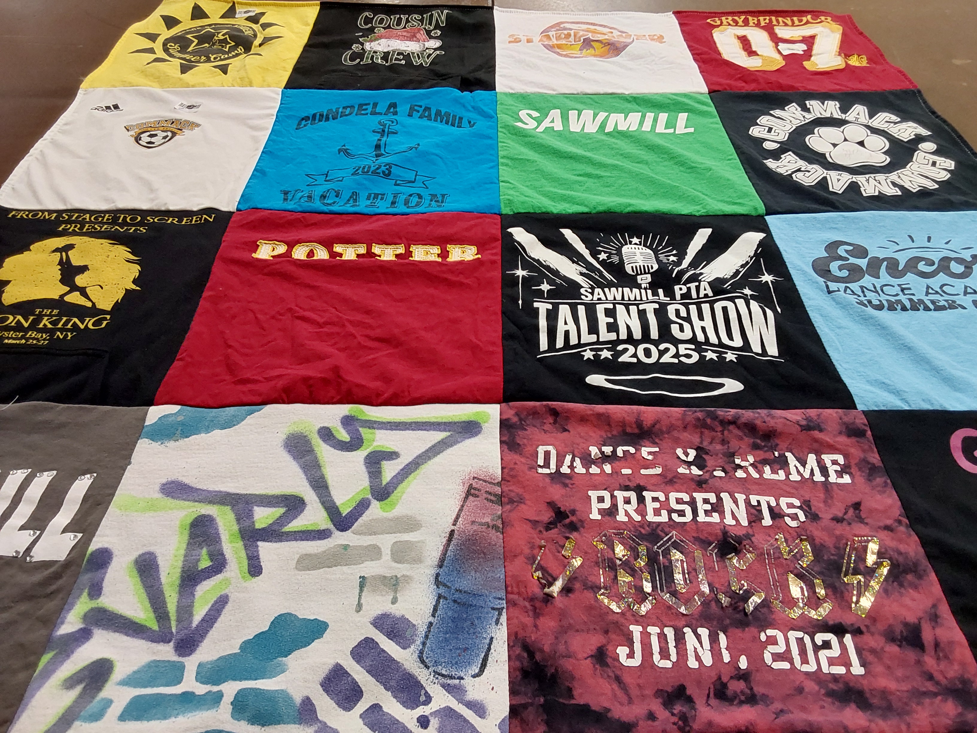 T-shirt quilt with musicals, vacation themes by Nicole from NY