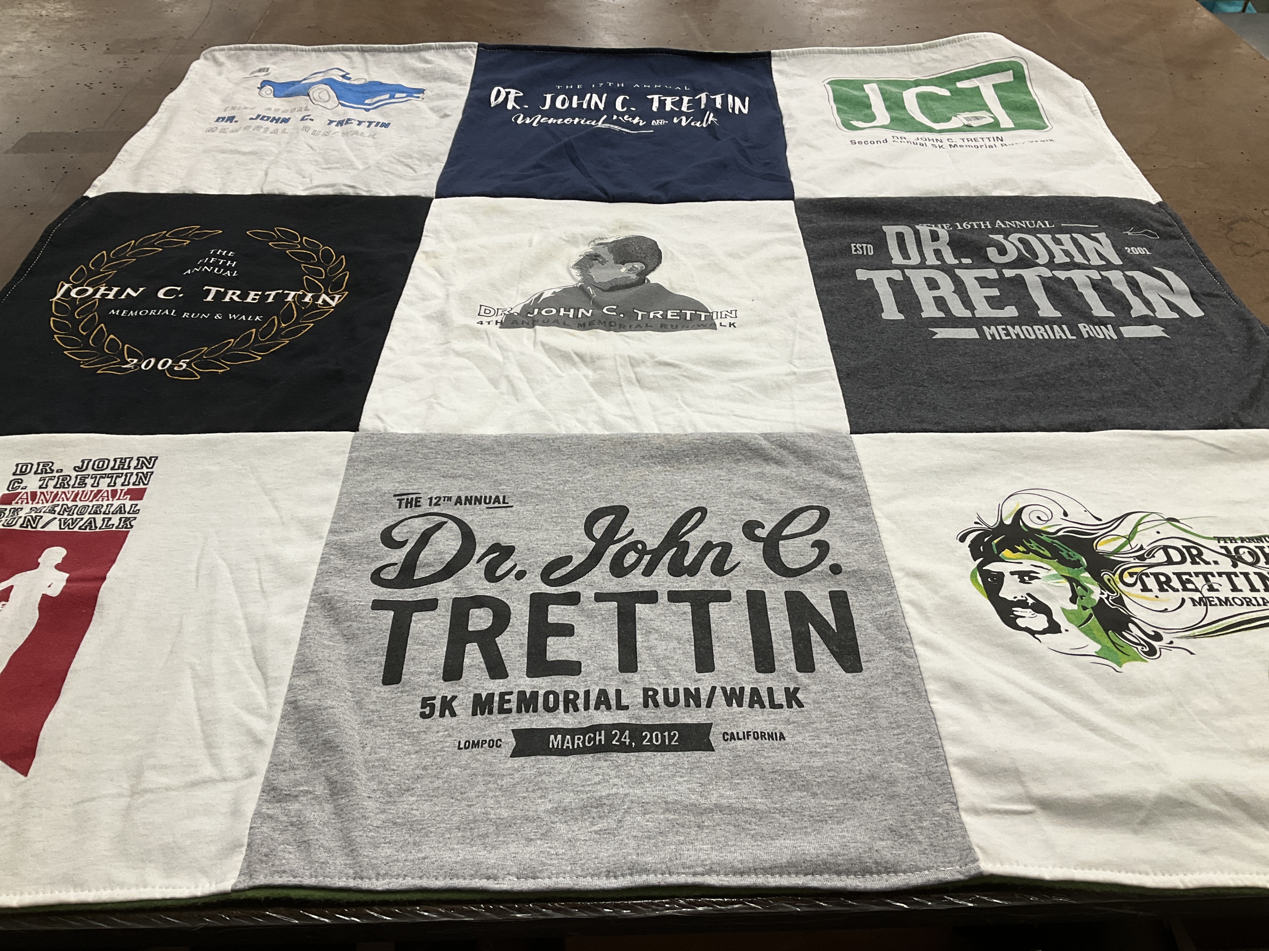 T-shirt quilt with running, memorial events themes by Kelly from TX