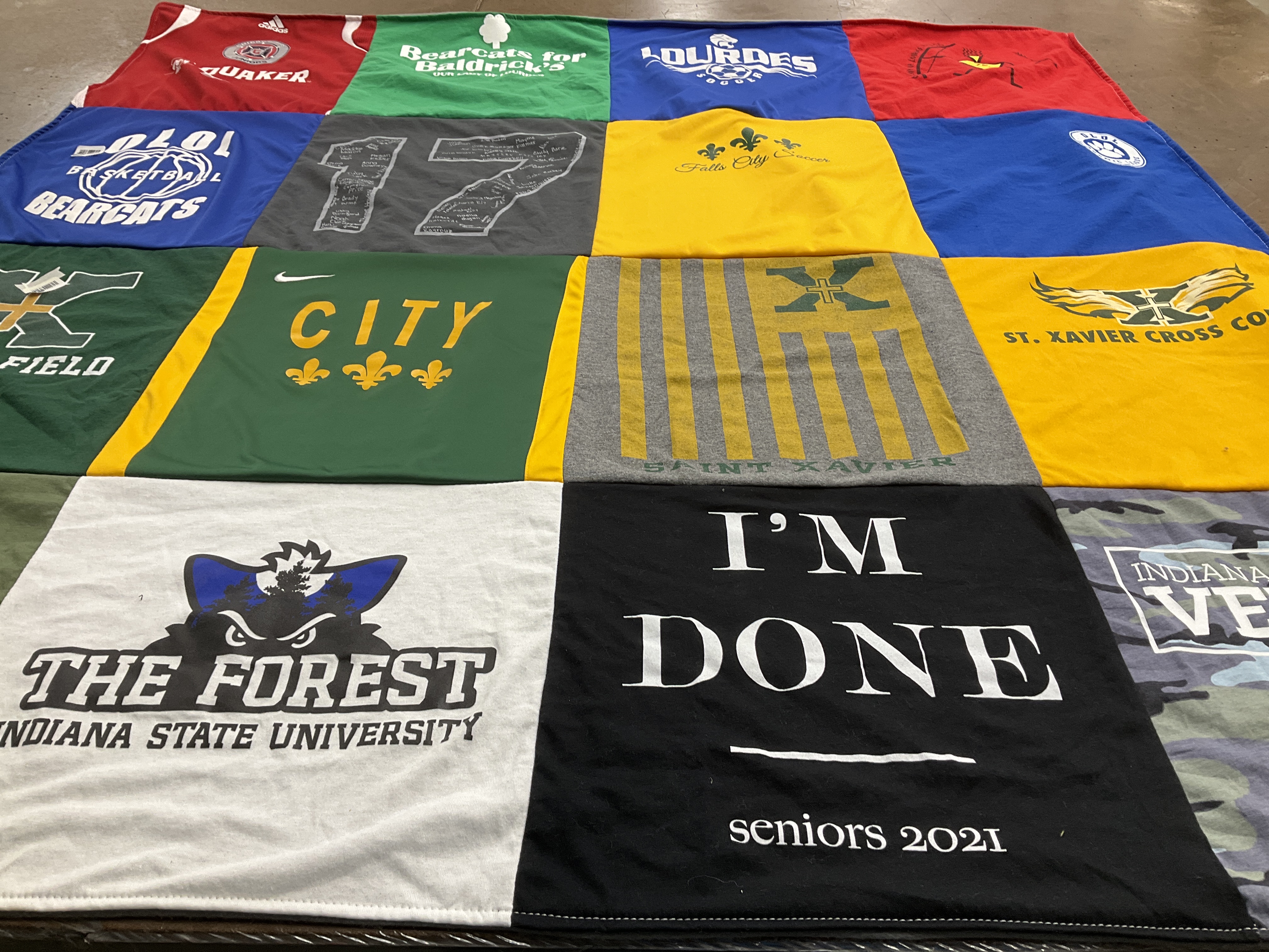 T-shirt quilt featuring bearcats, saint xavier cross country by Amy from KY