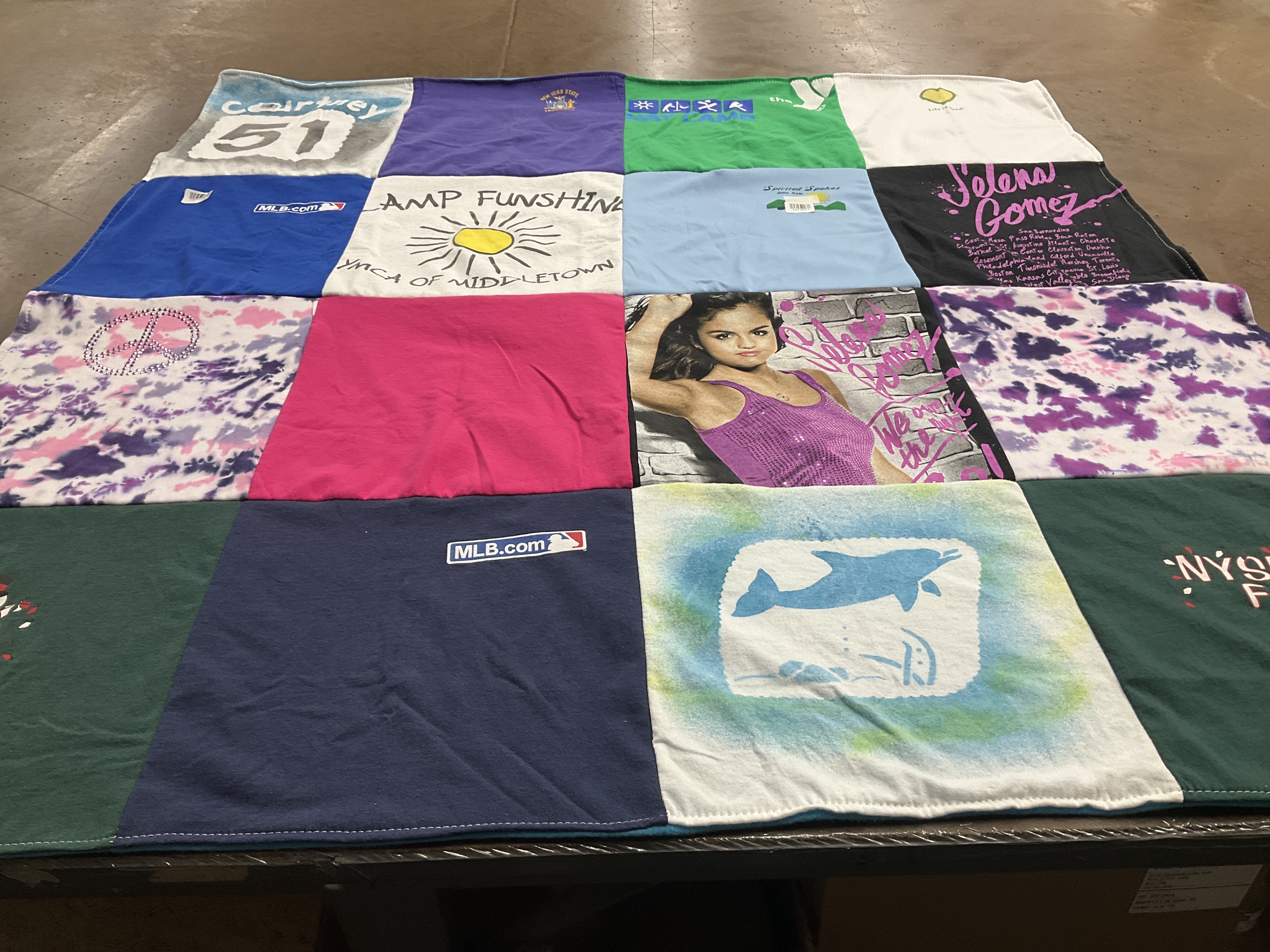T-shirt quilt with sports, youth programs themes by Jason from NY