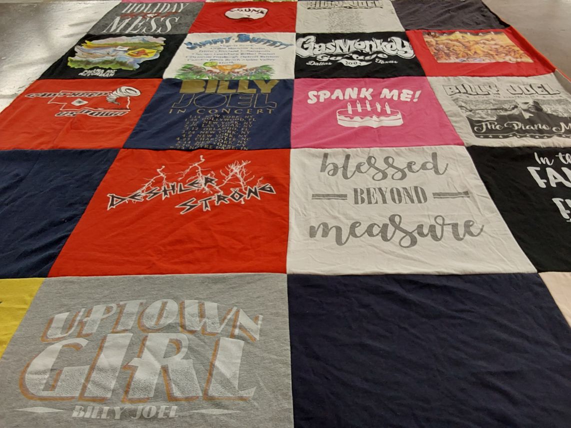 T-shirt quilt with music, concerts themes by Kathy from NE