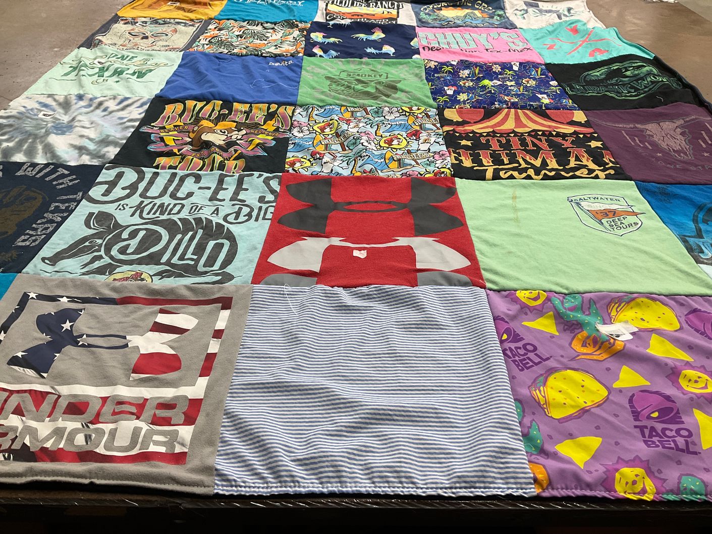 T-shirt quilt with travel, food themes by Jessica from TX