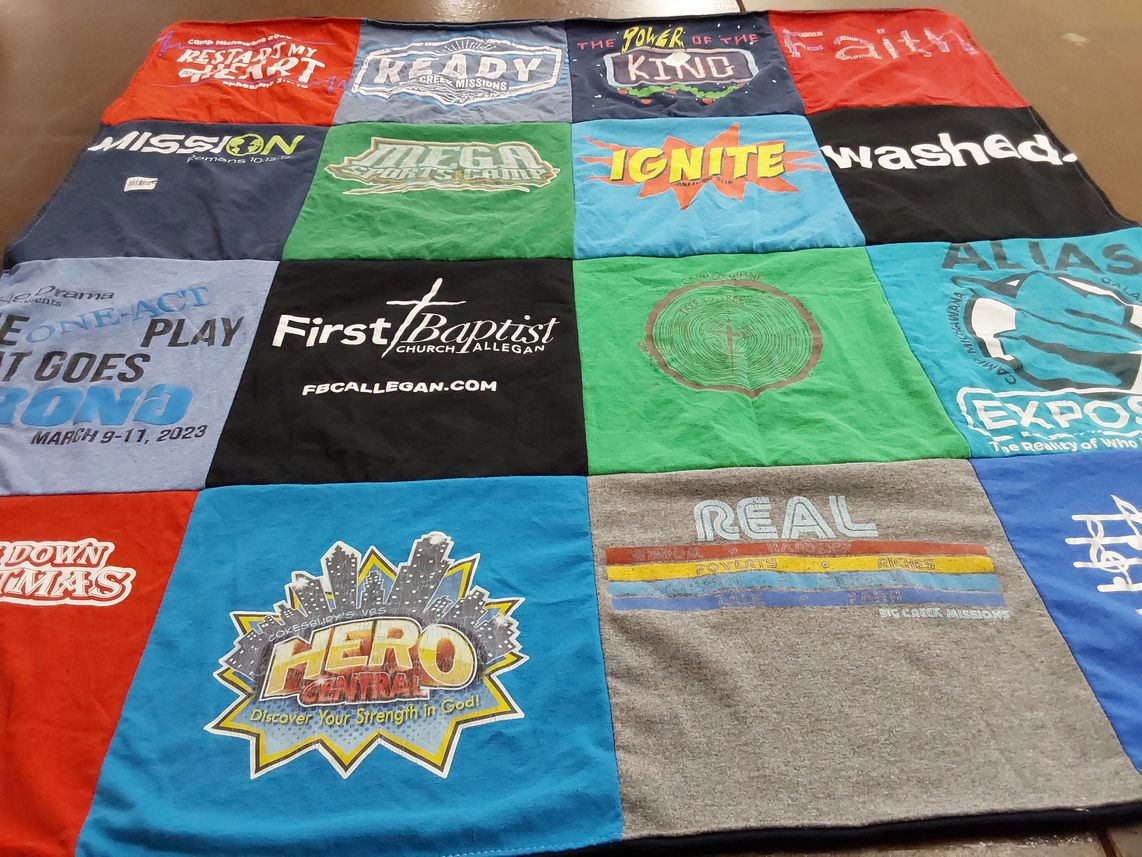 T-shirt quilt with faith, mission work themes by Suzanne from MI