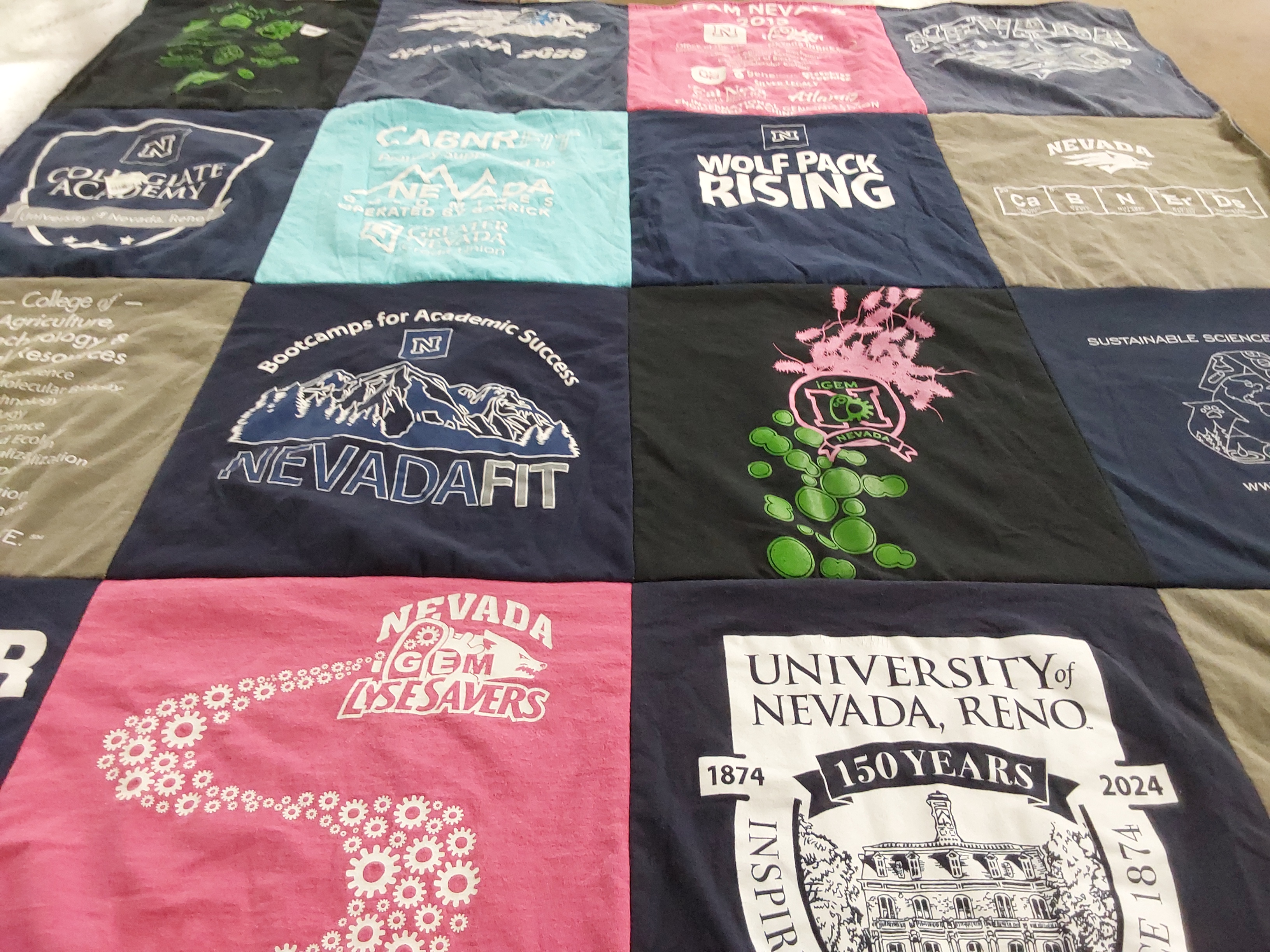 T-shirt quilt featuring wolf pack by Christie from NV