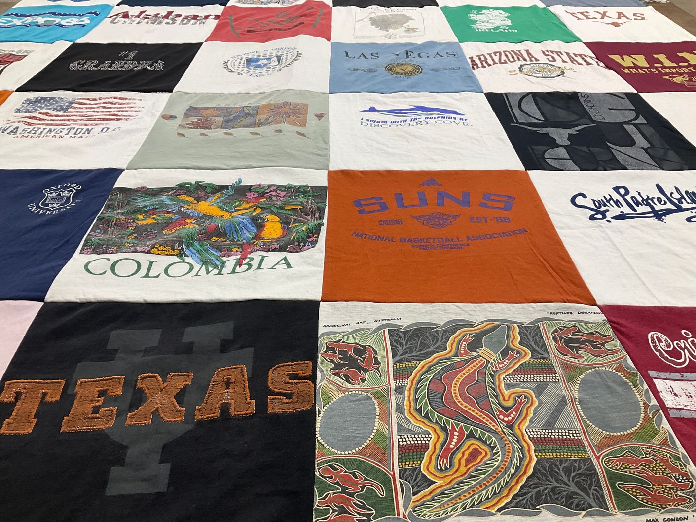 T-shirt quilt featuring suns by Wray from TX