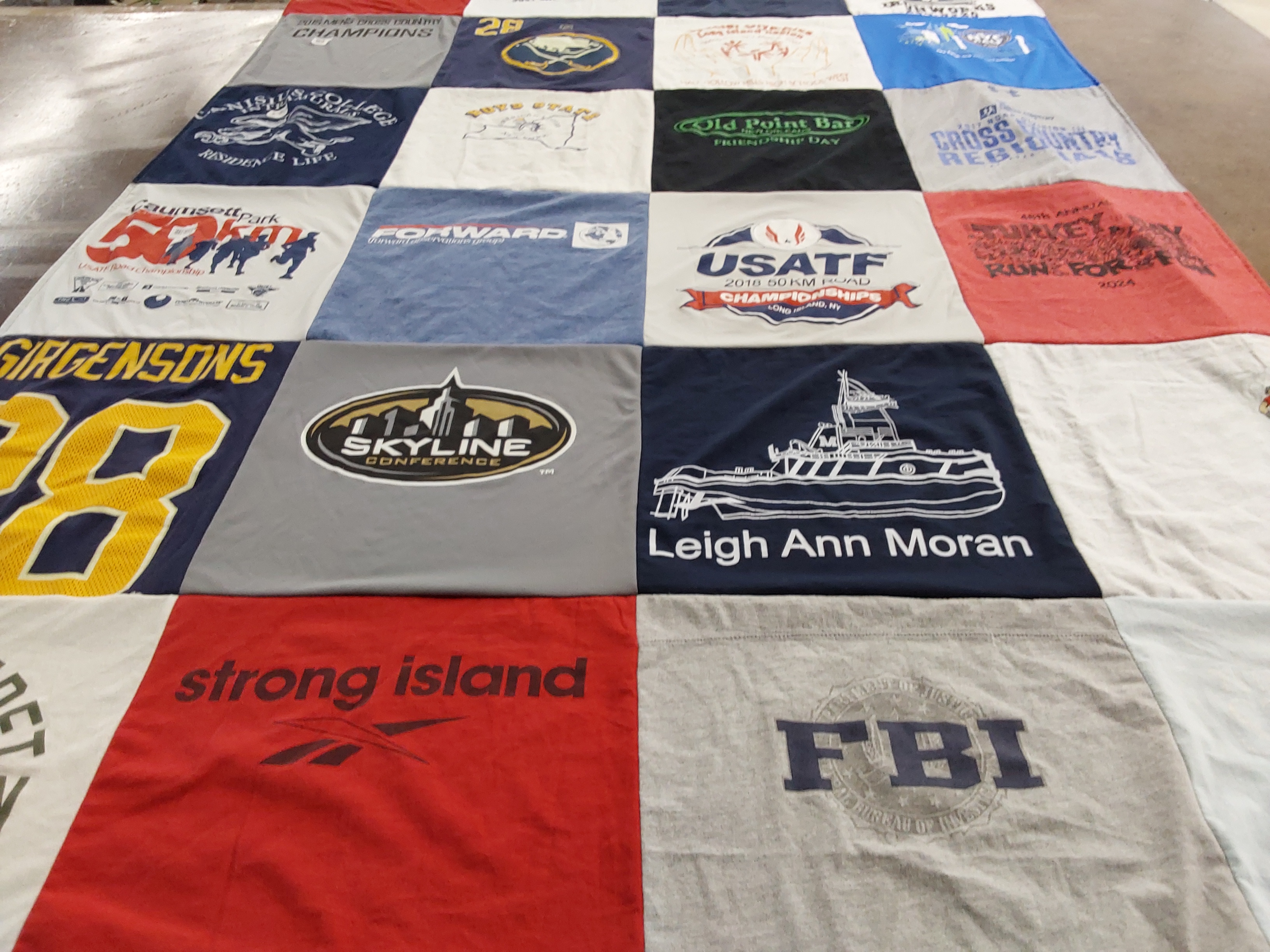 T-shirt quilt with running, sports themes by Christian from NY