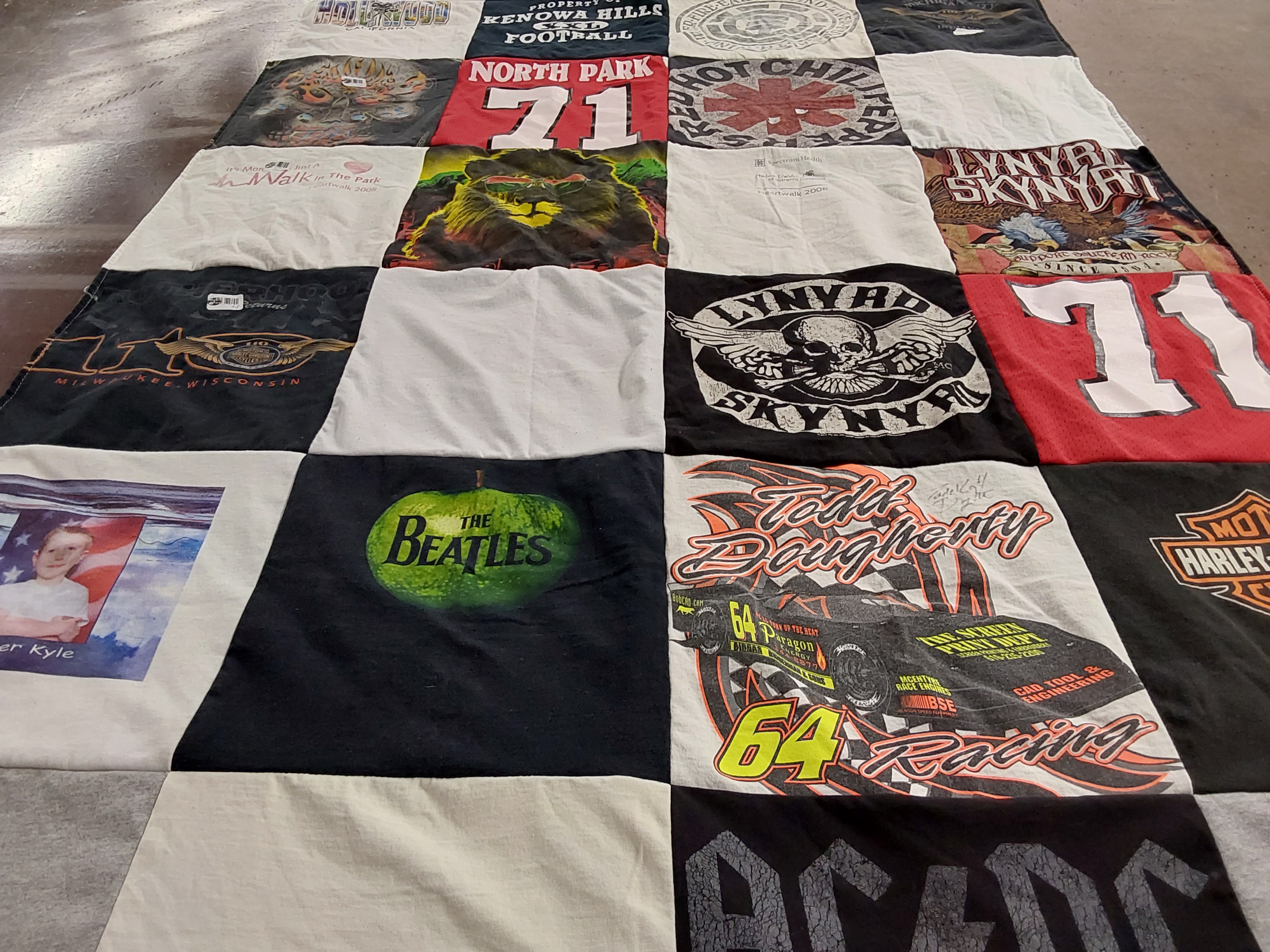 T-shirt quilt with music, racing themes by Vanessa from MI