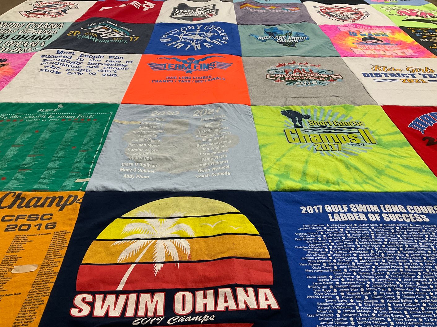 T-shirt quilt with swimming, sports themes by Kelly from TX