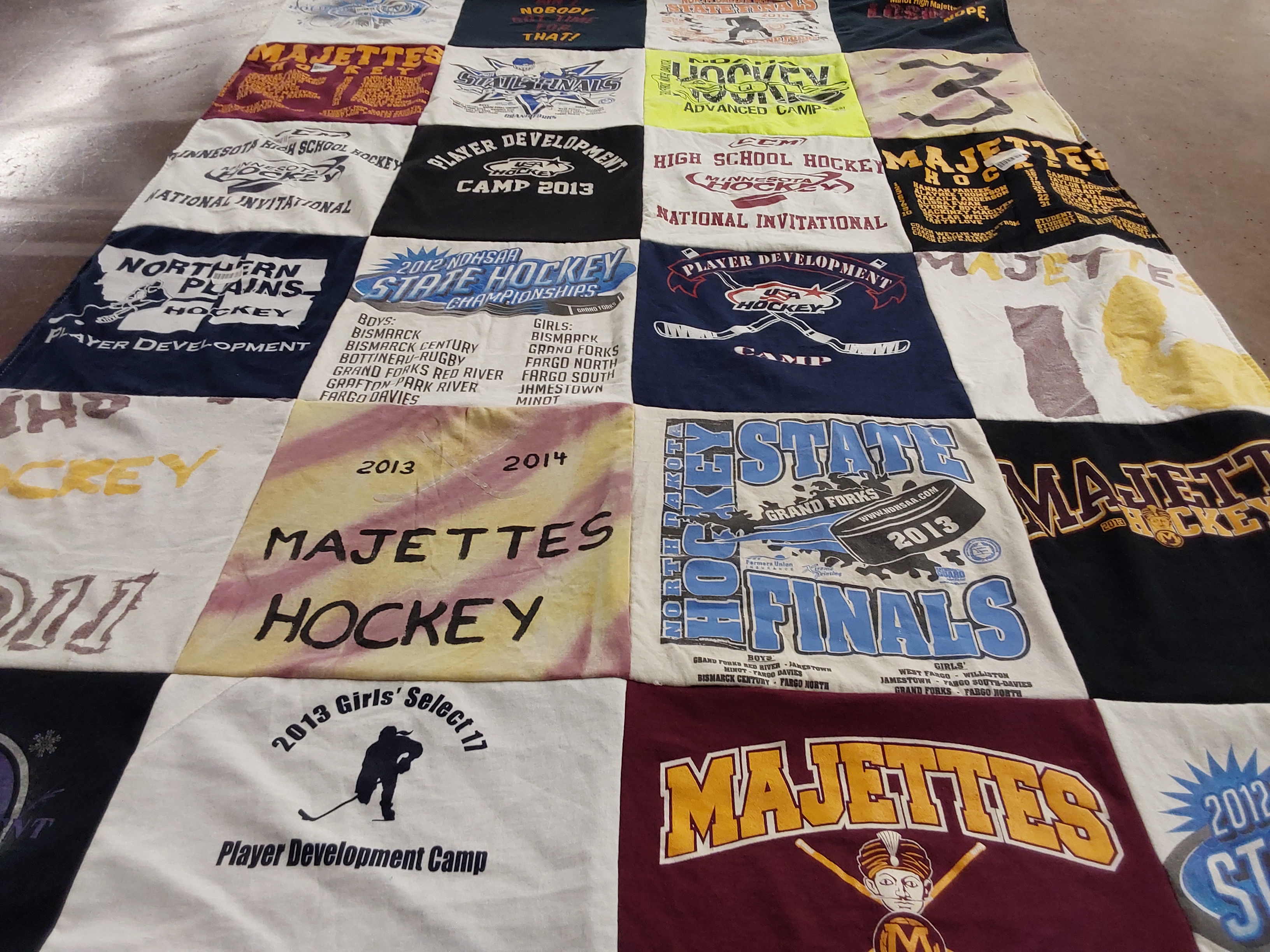 T-shirt quilt featuring majettes hockey by Makaila from MN