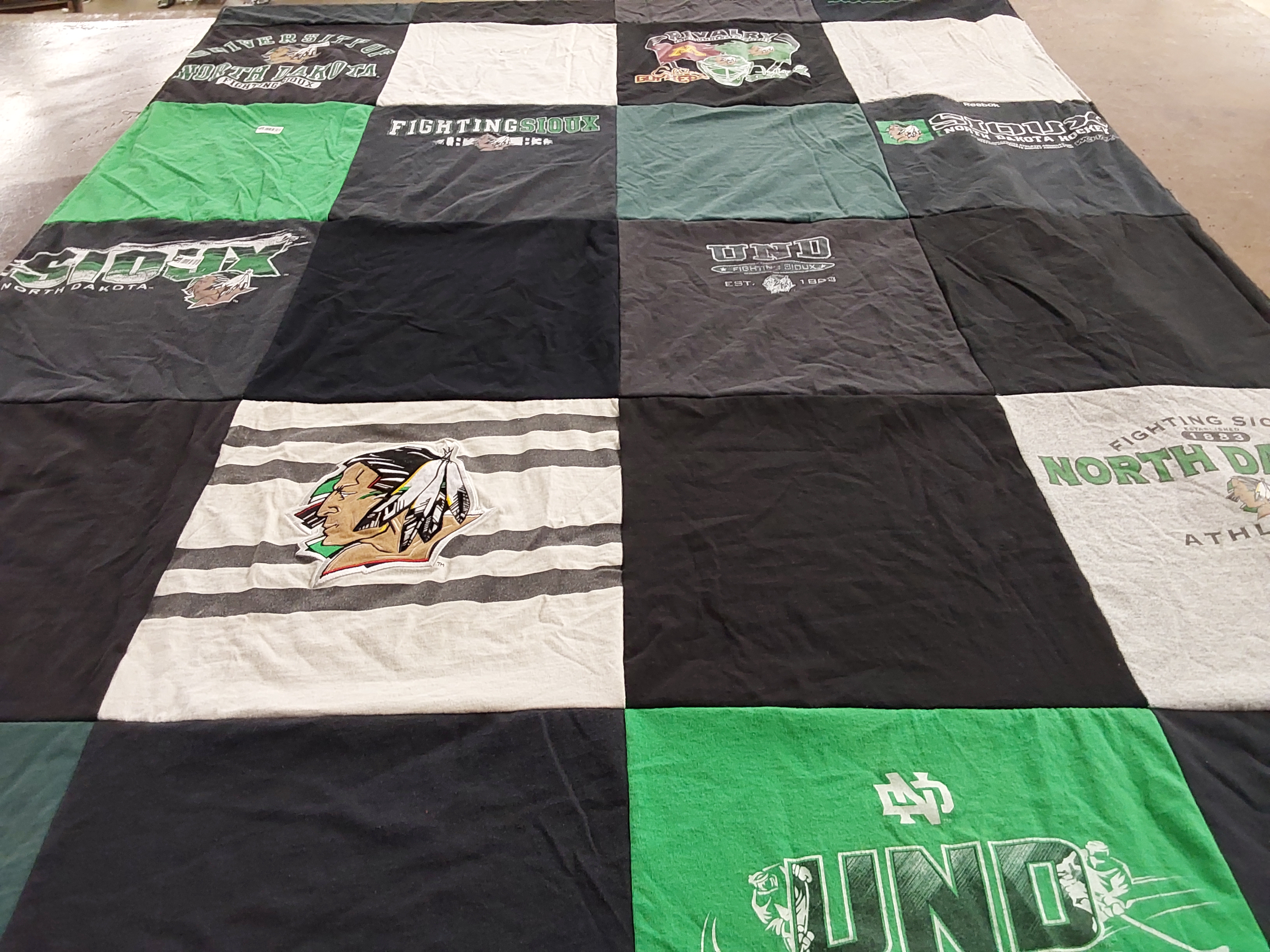 T-shirt quilt featuring fighting sioux by Doug from ND