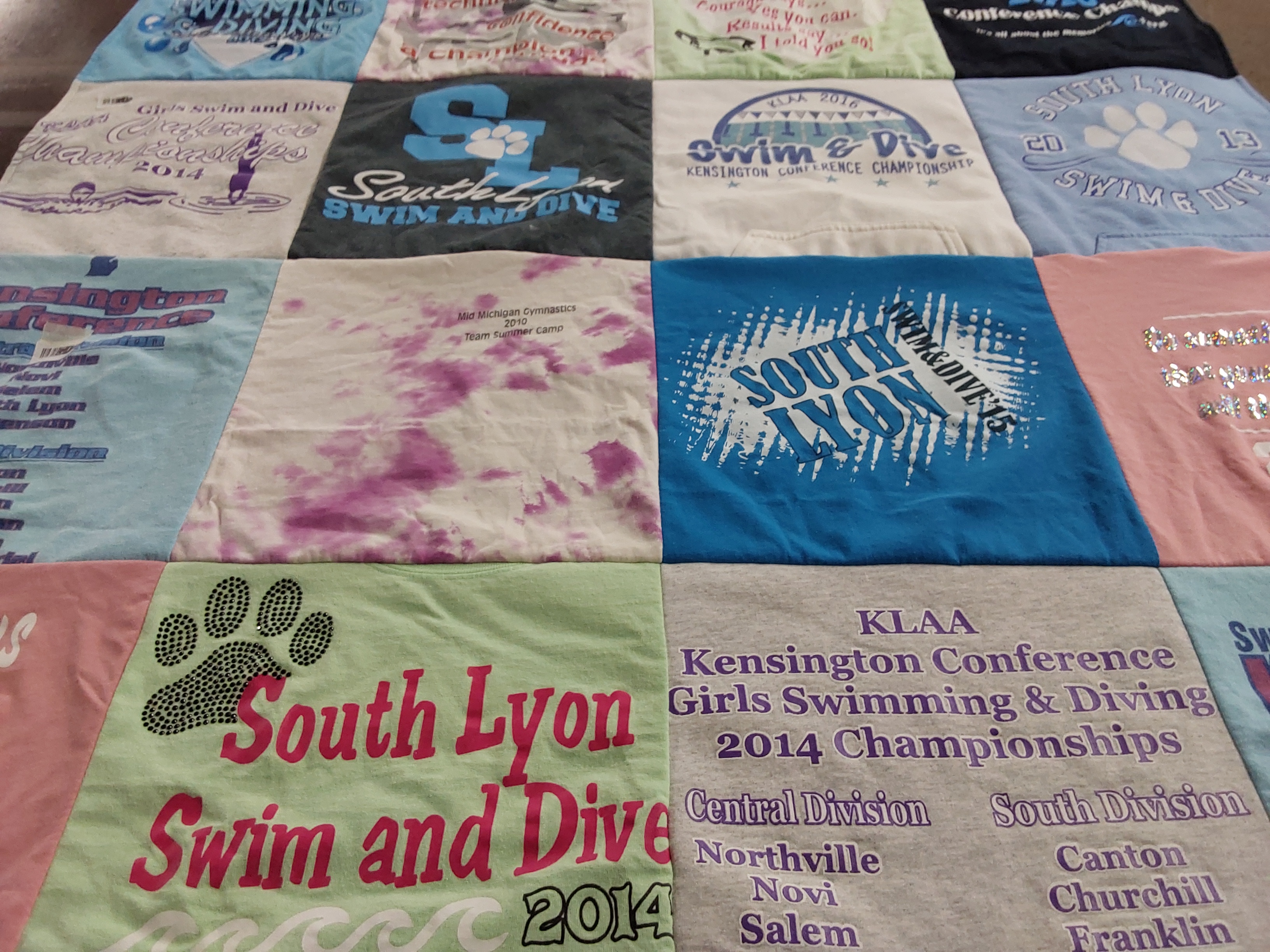 T-shirt quilt featuring south lyon swim and dive by SUSAN from MI