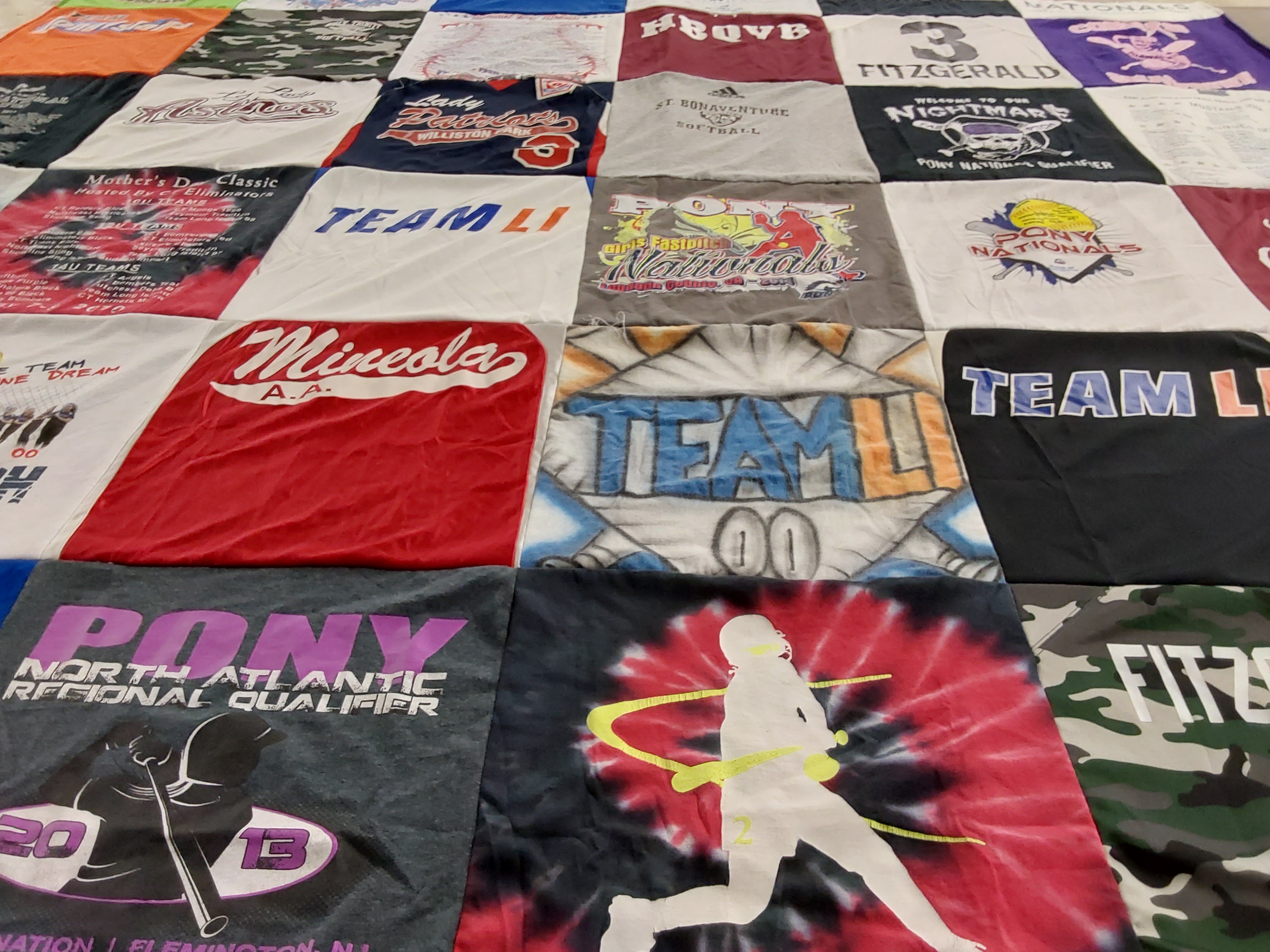 T-shirt quilt featuring team li by Tara from NY