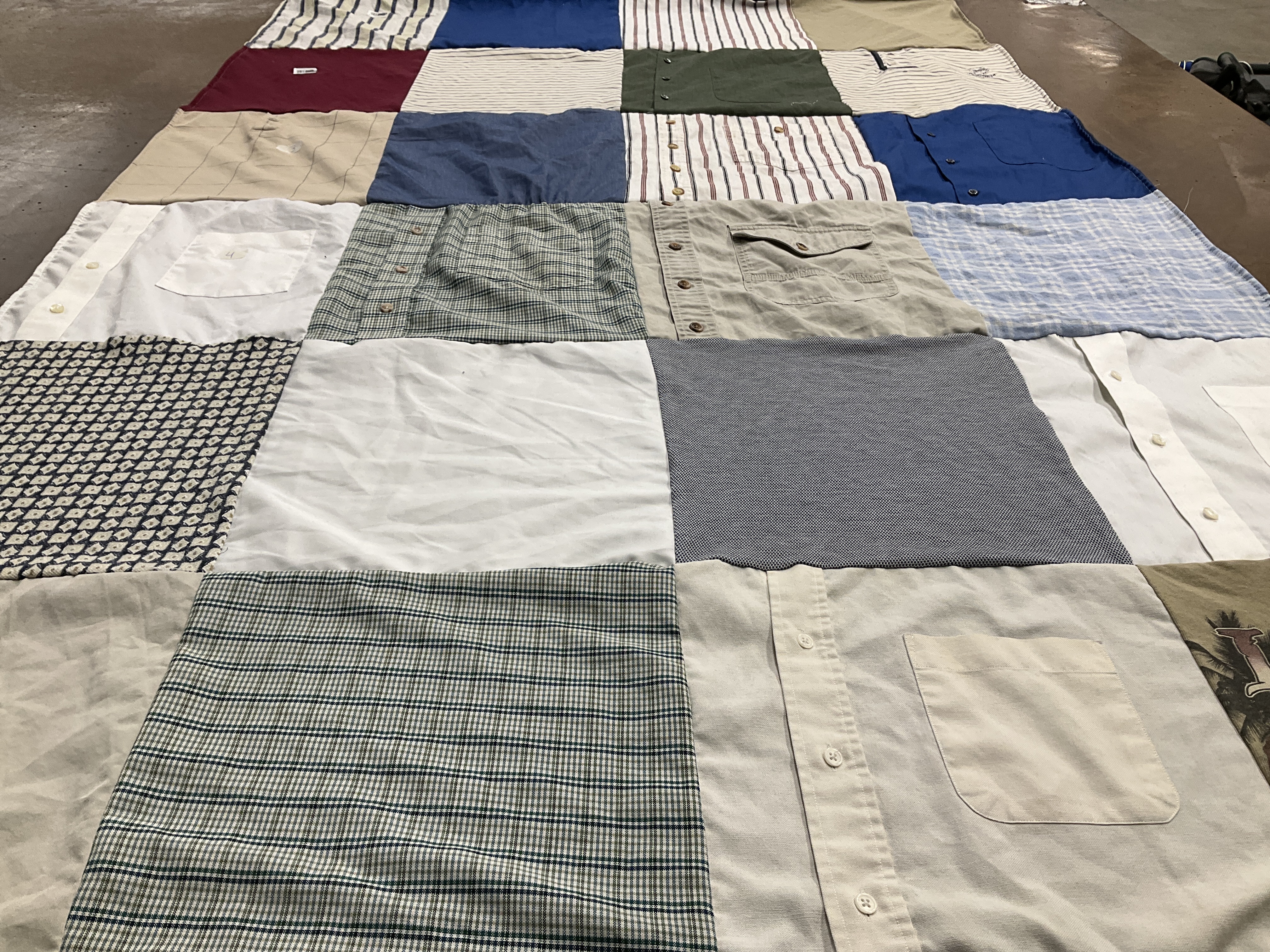 T-shirt quilt with sewing, quilting themes by Kim from WV