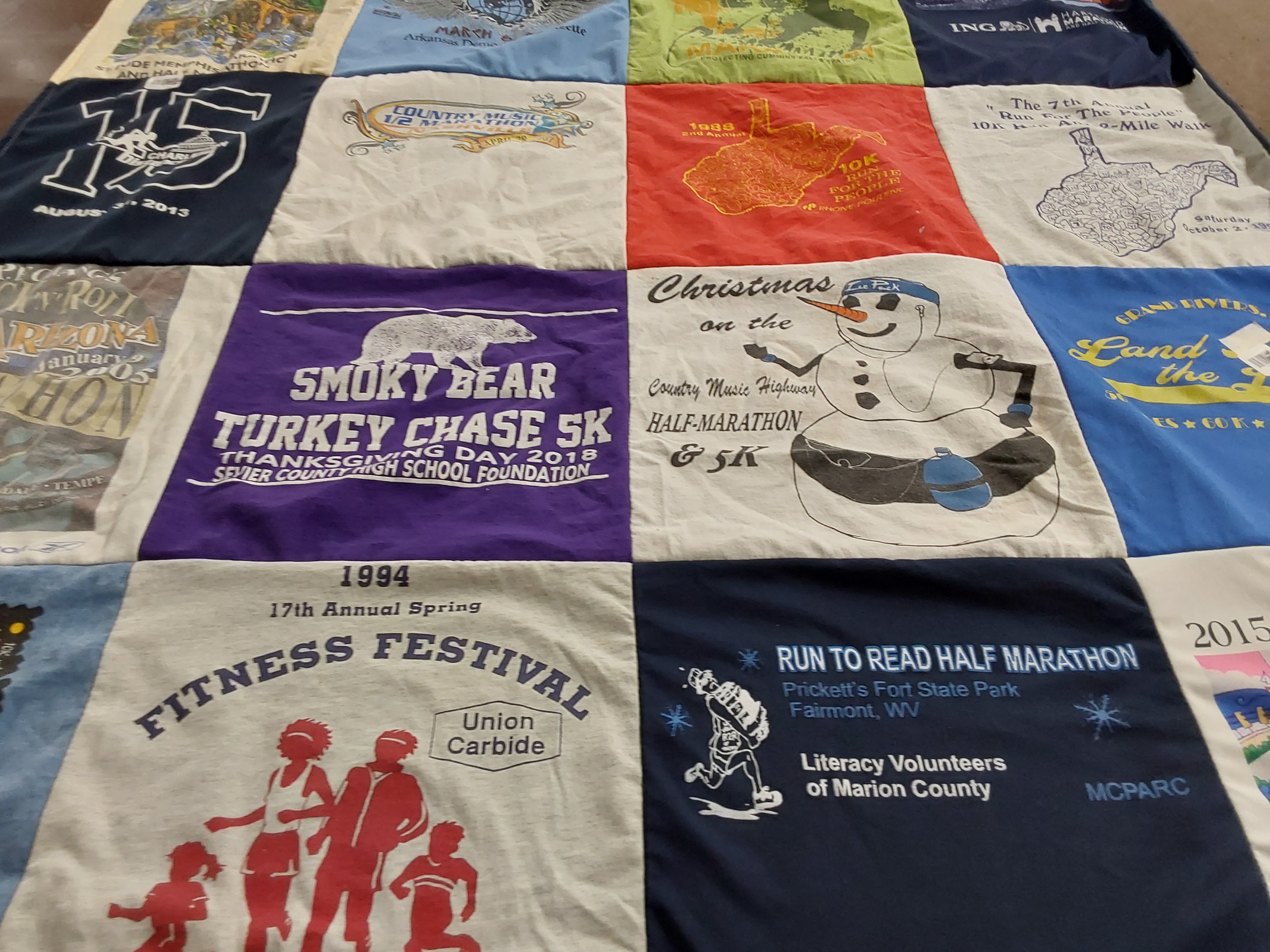 T-shirt quilt with running, fitness themes by Joy from WV