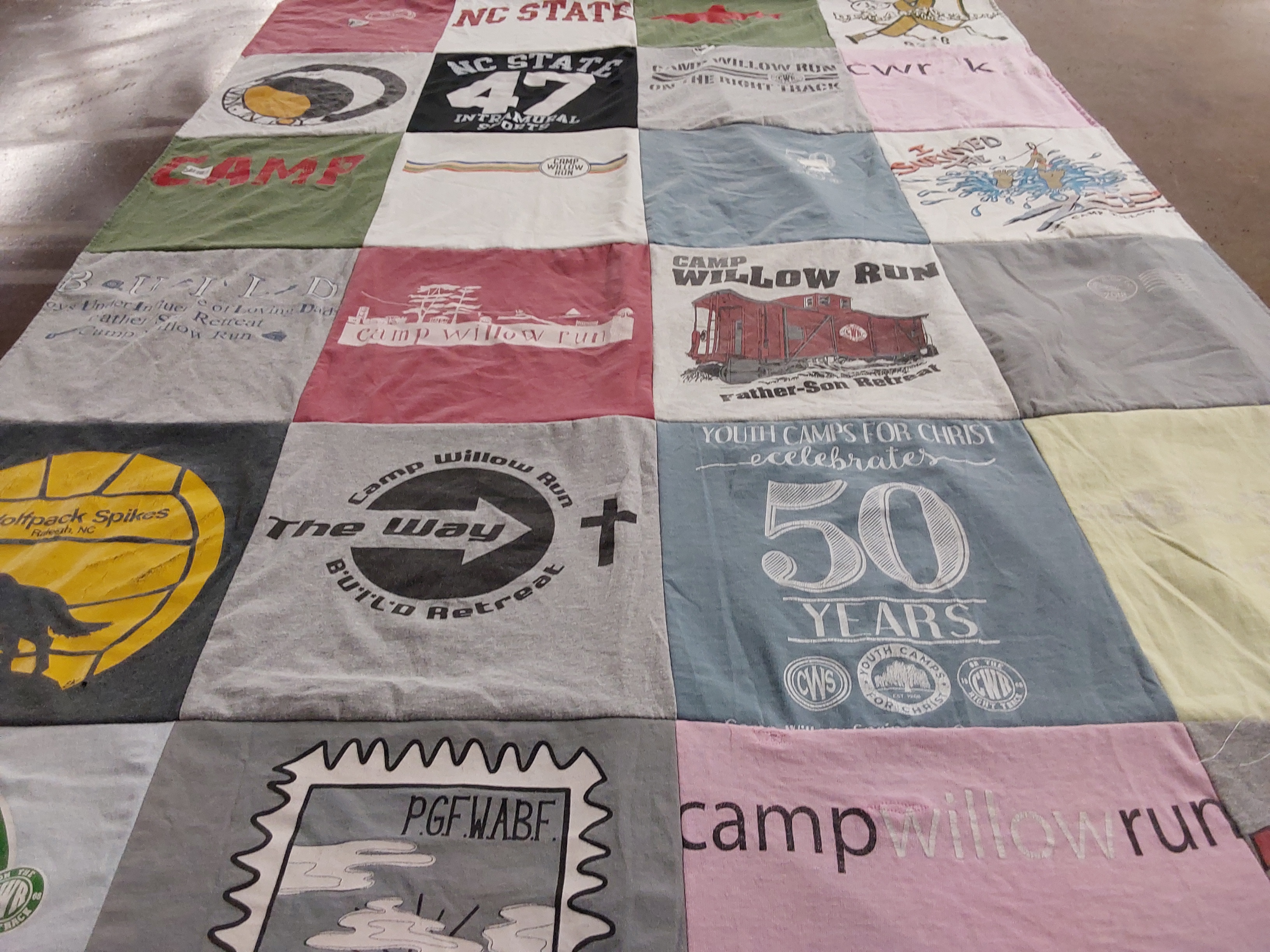 T-shirt quilt featuring wolfpack spikes by Lesley from NC