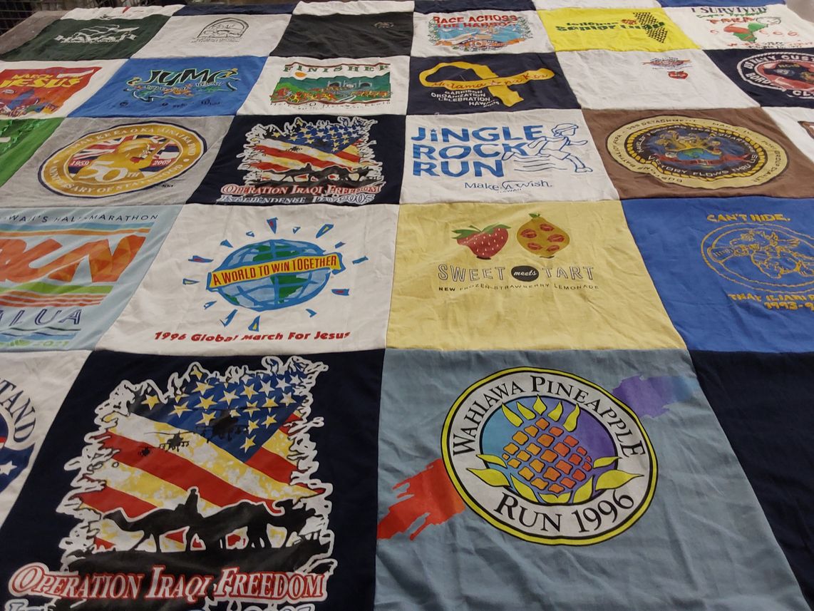 T-shirt quilt with running, events themes by Liz from HI