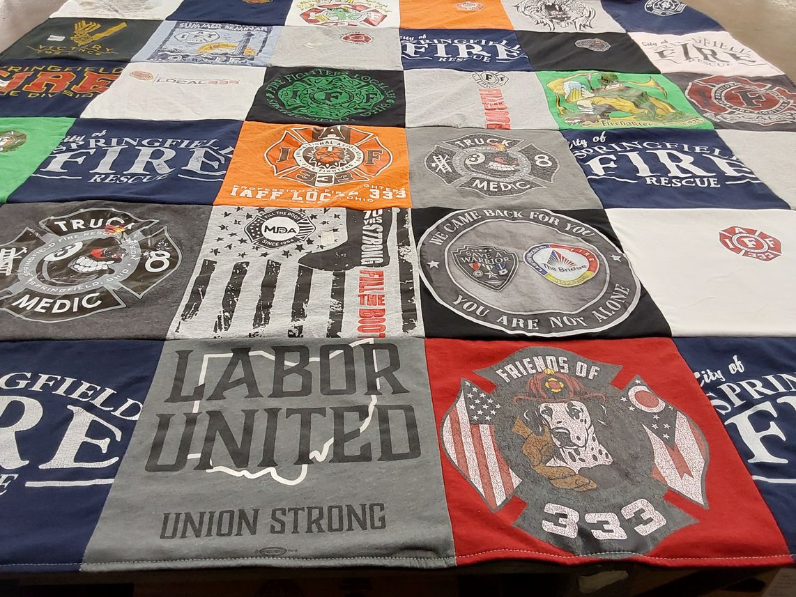 T-shirt quilt with firefighting, emergency services themes by Chester from OH