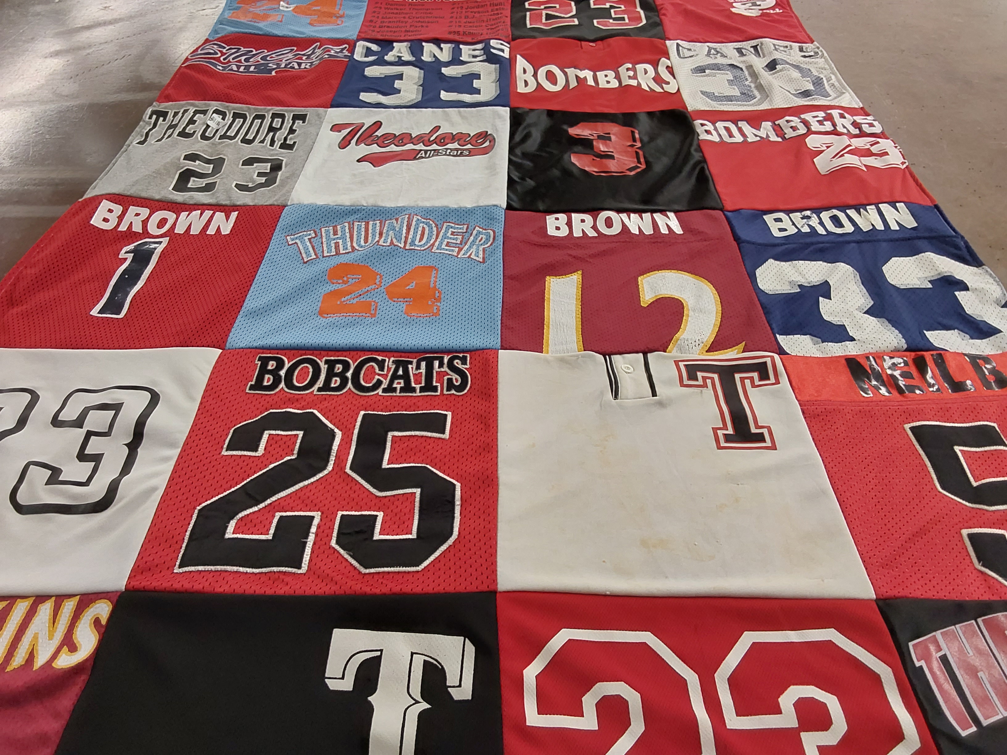 T-shirt quilt with sports, team activities themes by Chandra from AL