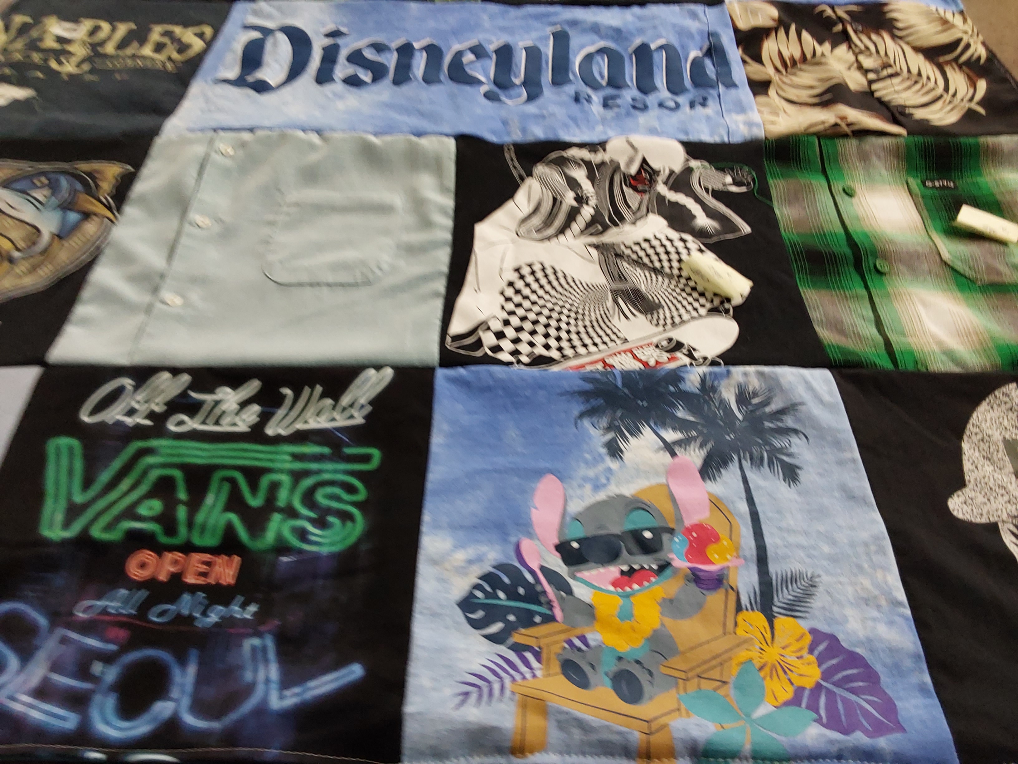 T-shirt quilt with disney, skateboarding themes by Tauni from CA
