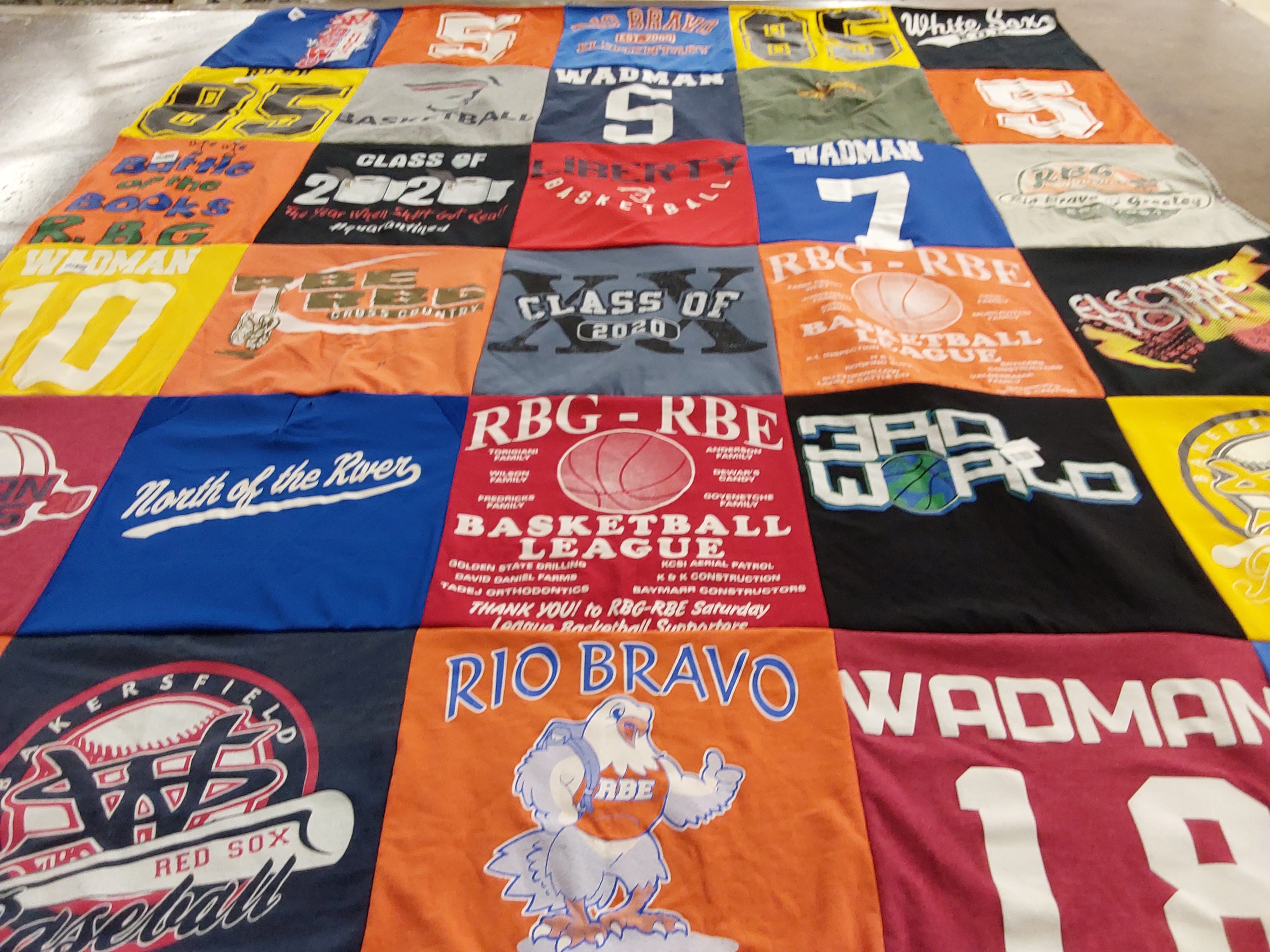 T-shirt quilt featuring red sox, basketball league by Lisa from CA