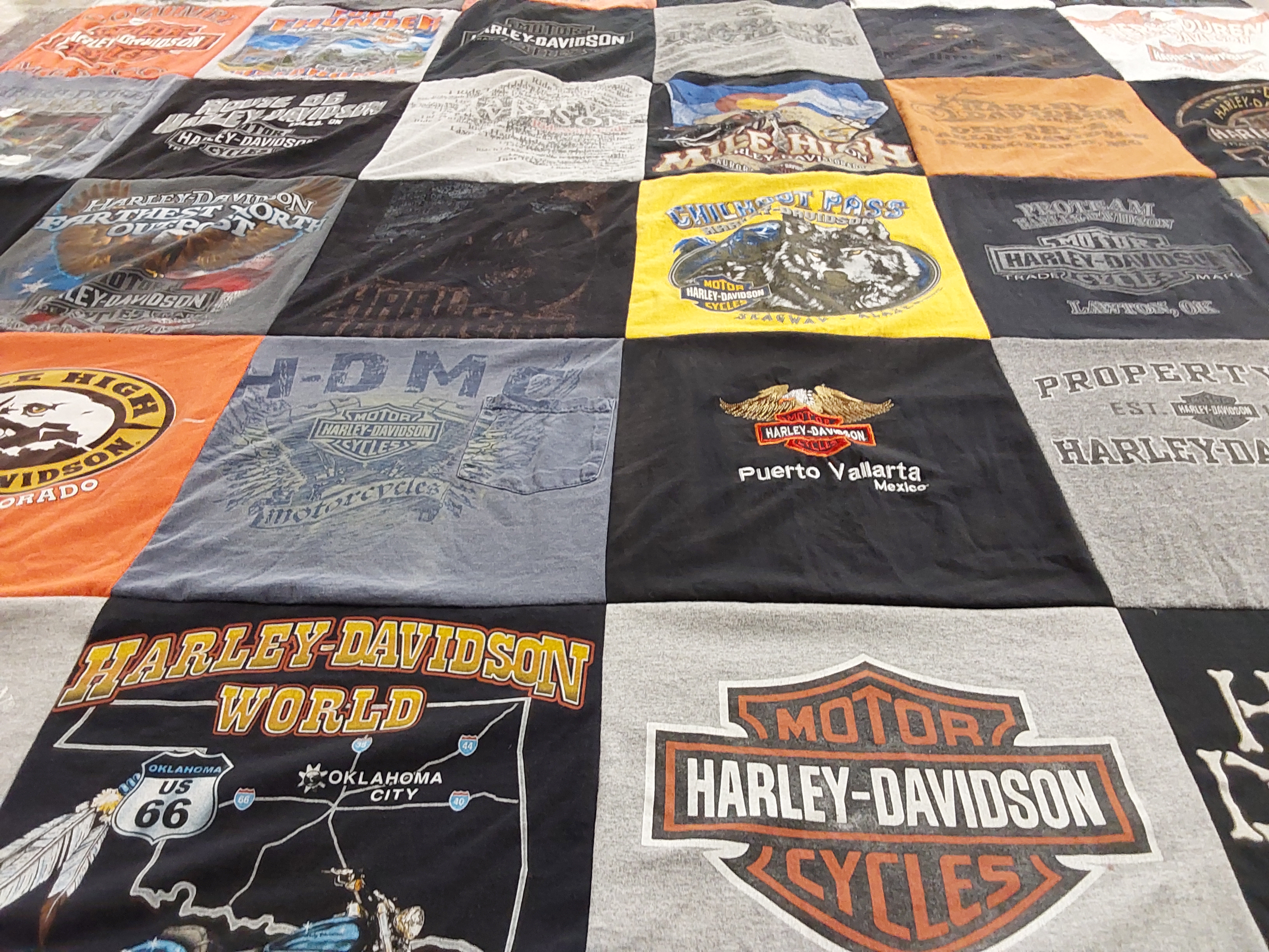 T-shirt quilt with motorcycles, travel themes by Amanda from OK