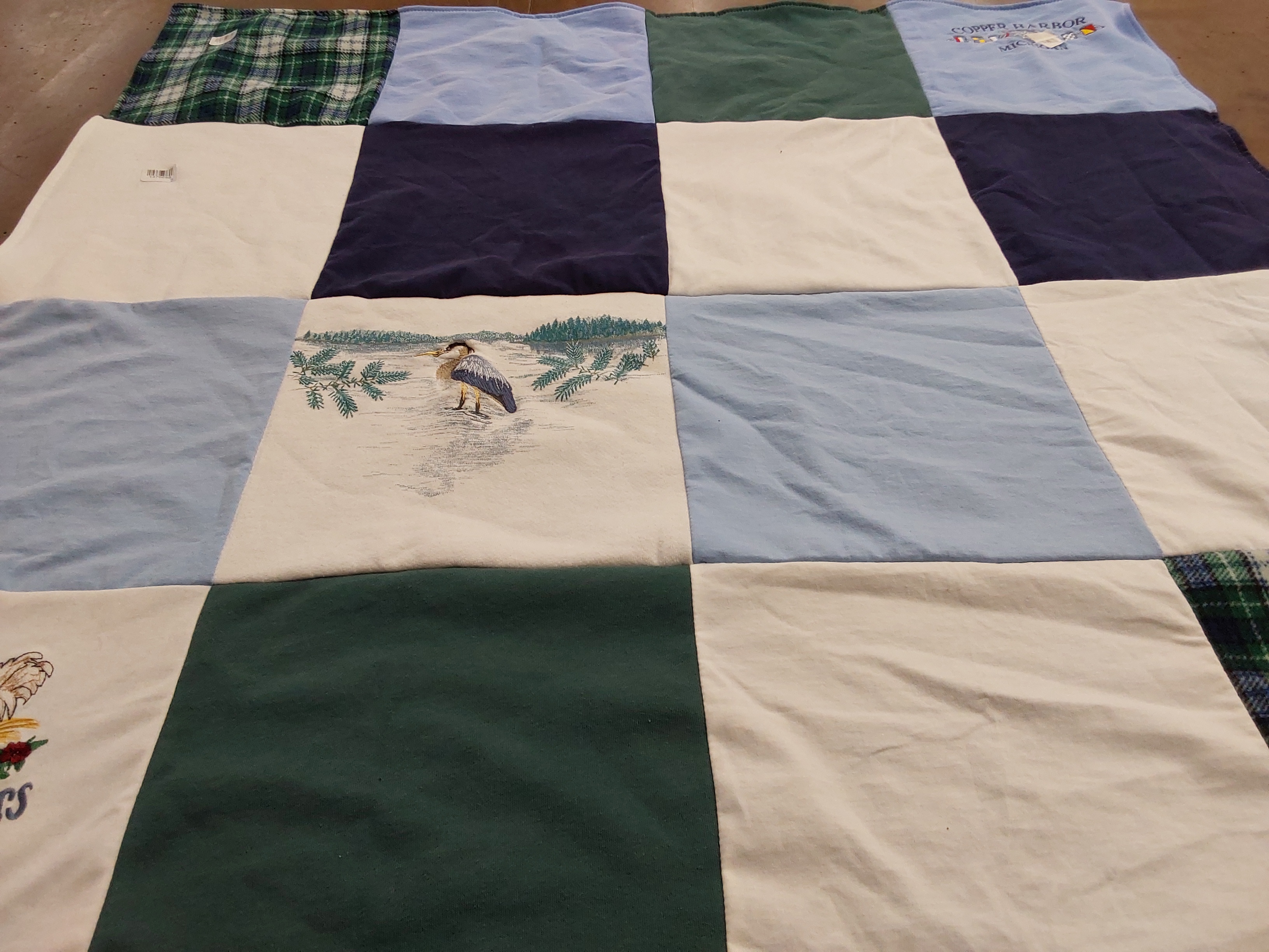 T-shirt quilt with nature, birds themes by Glenna from MI
