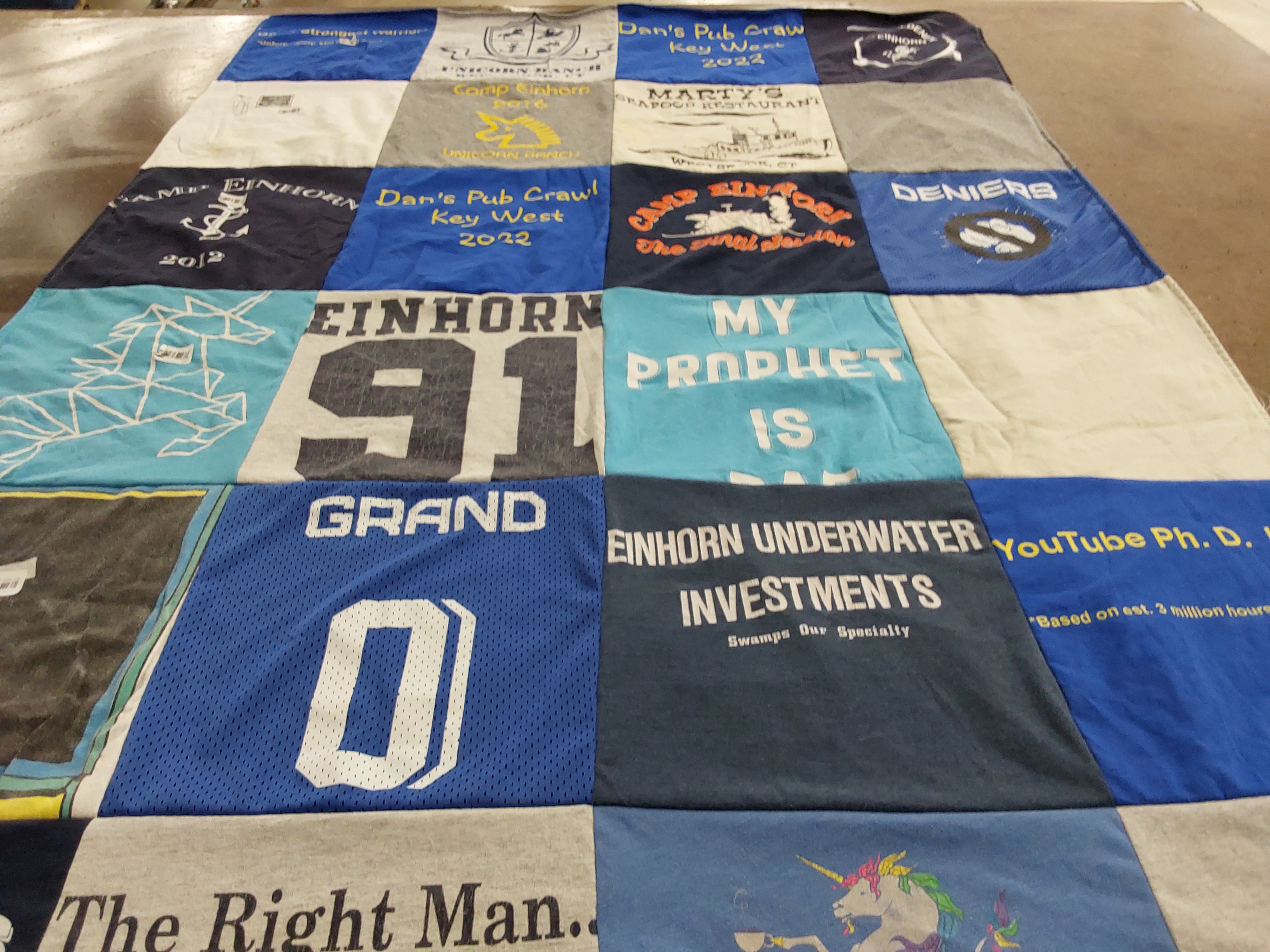 T-shirt quilt with camping, pub crawls themes by Rebecca from DC